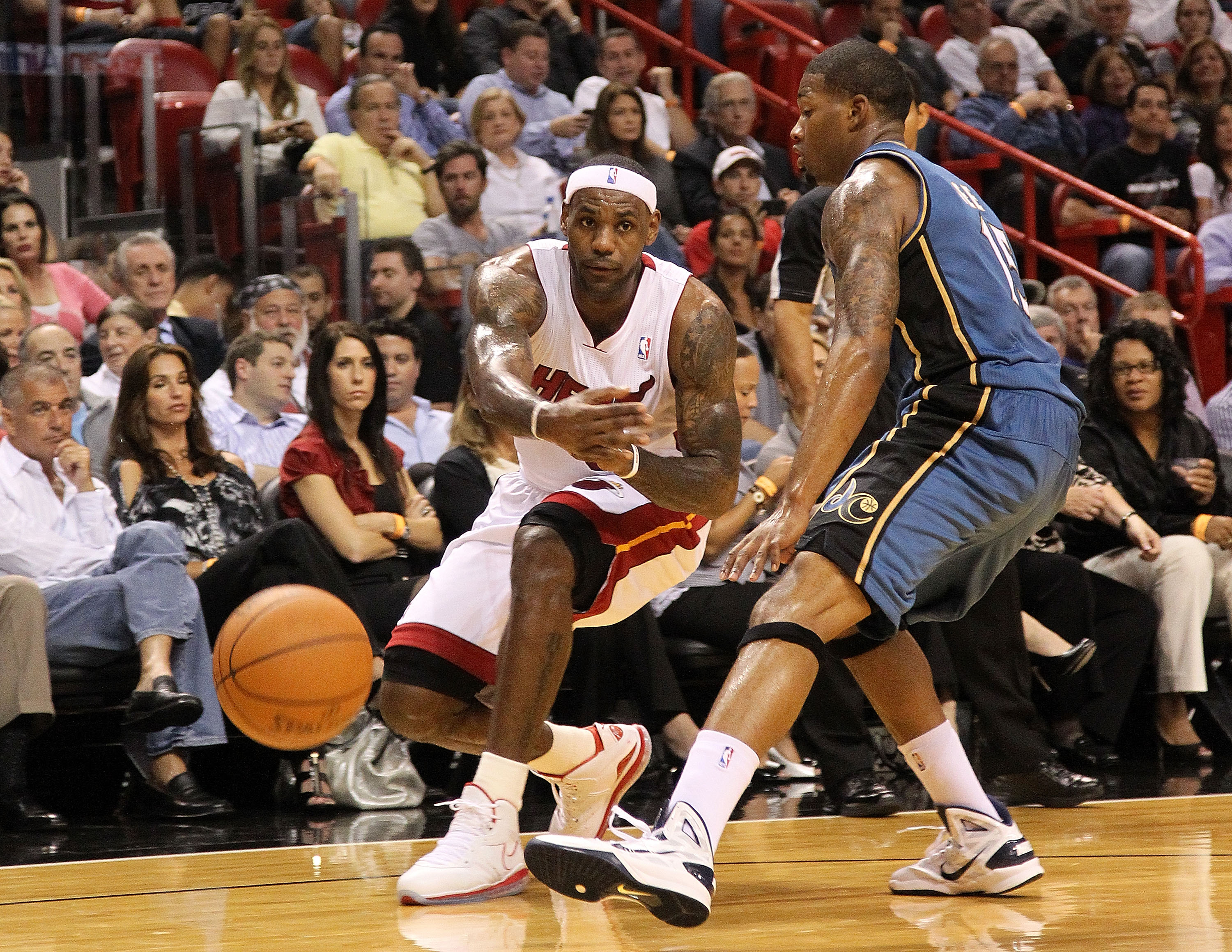 MIAMI, FL - NOVEMBER 29:  LeBron James #6 of the Miami Heat passes during a game against the Washington Wizards at American Airlines Arena on November 29, 2010 in Miami, Florida. NOTE TO USER: User expressly acknowledges and agrees that, by downloading an