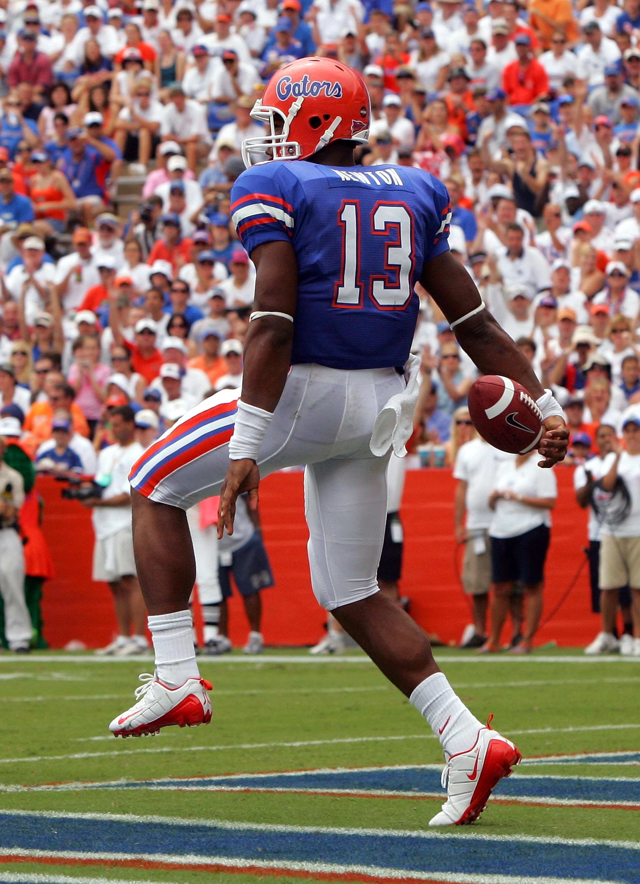 GAINESVILLE, FL - AUGUST 30:  Quarterback Cameron Newton #13 of the Florida Gators celebrates a touchdown during his game against the Hawaii Warriors at Ben Hill Griffin Stadium on August 30, 2008 in Gainesville, Florida.  (Photo by Sam Greenwood/Getty Im