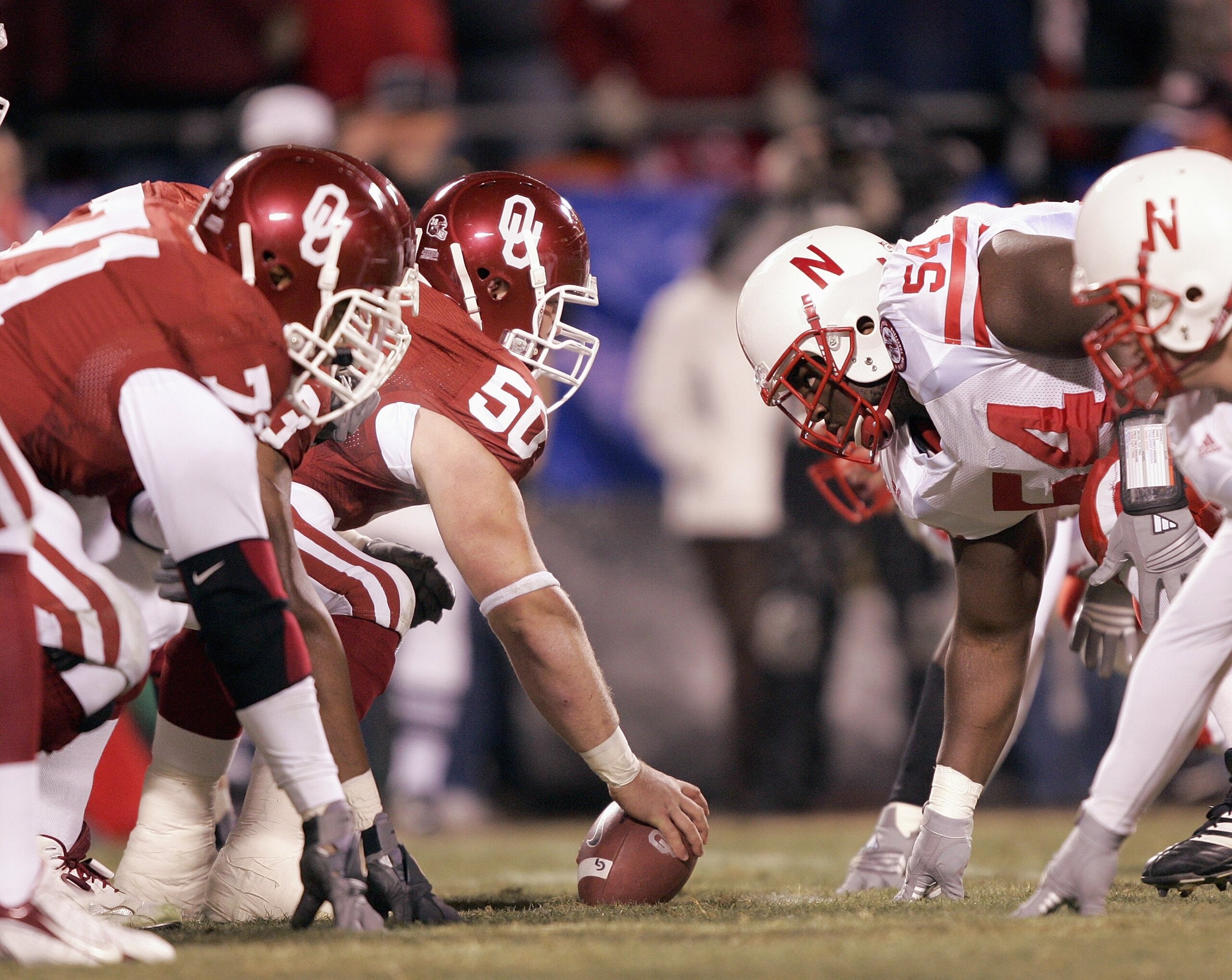 KANSAS CITY, MO - DECEMBER 2:  Center Jon Cooper #50 of the Oklahoma Sooners faces off against the Nebraska Cornhuskers during the 2006 Dr. Pepper Big 12 Championship on December 2, 2006 at Arrowhead Stadium in Kansas City, Missouri. The Sooners won 21-7.