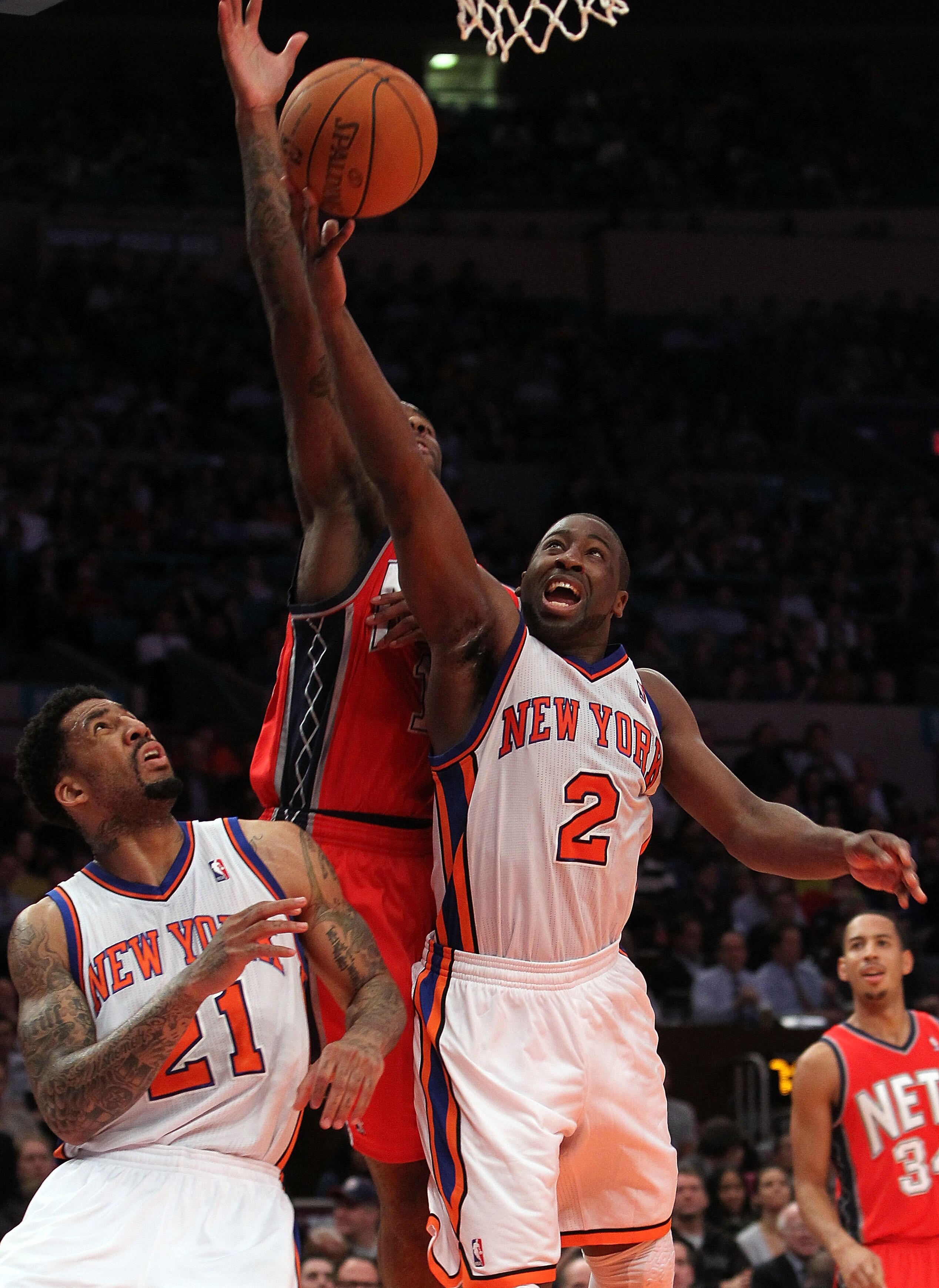 NEW YORK, NY - NOVEMBER 30:  Raymond Felton #2 of the New York Knicks lays the ball up agaisnt the New Jersey Nets on November 30, 2010 at Madison Square Garden in New York City. NOTE TO USER: User expressly acknowledges and agrees that, by downloading an