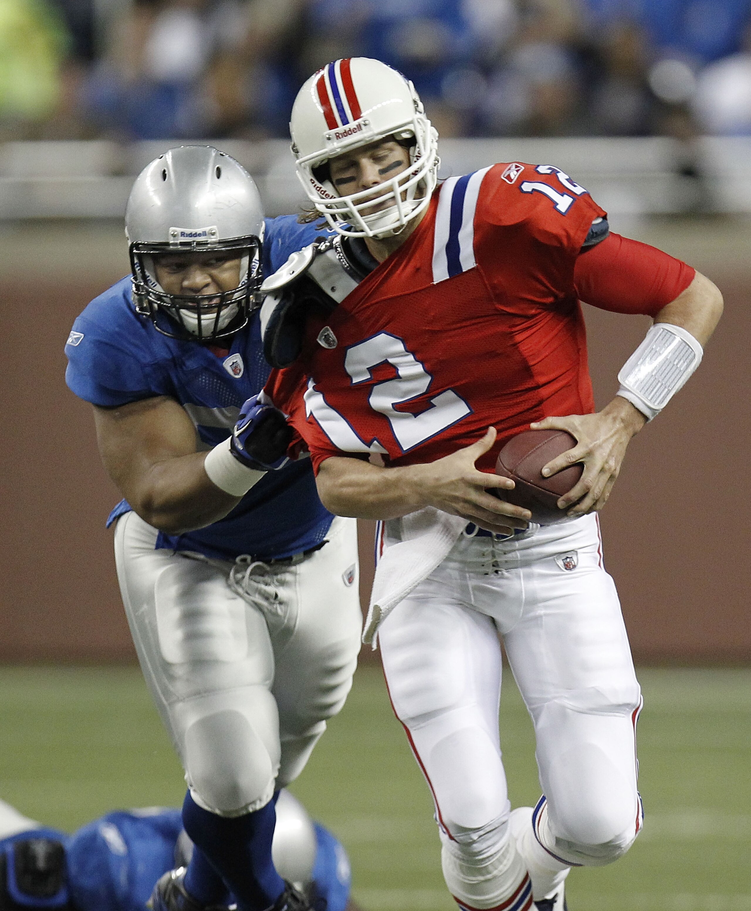 DETROIT - NOVEMBER 25: Tom Brady #12 of the New England Patriots is sacked by Ndamukong Suh #90 of the Detroit Lions on November 25, 2010 at Ford Field in Detroit, Michigan. (Photo by Gregory Shamus/Getty Images) DETROIT - NOVEMBER 25: Tom Brady #12 of the New England Patriots is sacked by Ndamukong Suh #90 of the Detroit Lions on November 25, 2010 at Ford Field in Detroit, Michigan. (Photo by Gregory Shamus/Getty Images)
