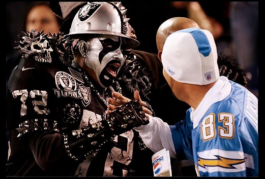 A Raider fan and a Charger fan?  What's next?  Cats and dogs?  Reps and Dems?  Make it STOP!