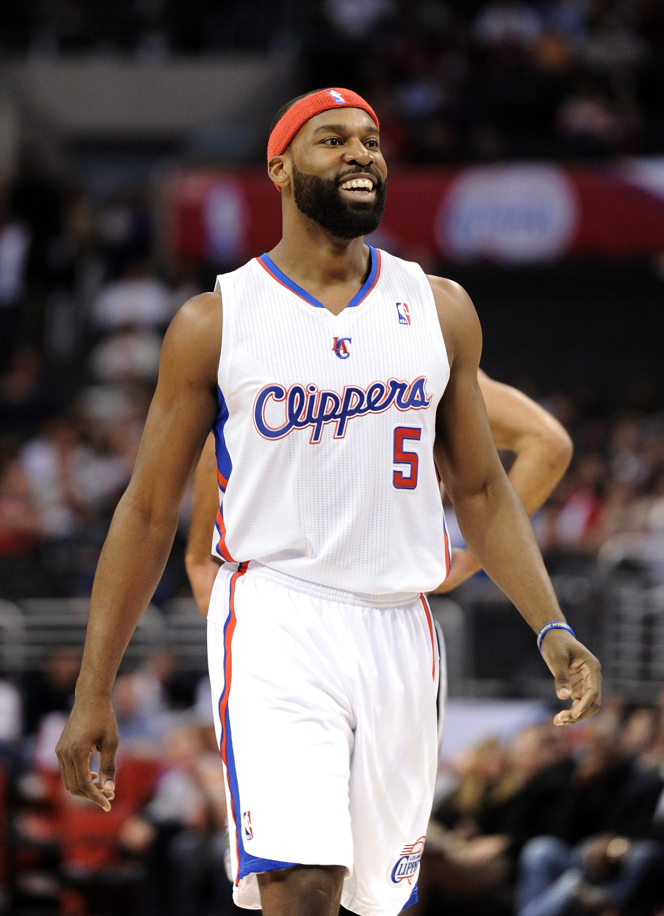 LOS ANGELES, CA - DECEMBER 01:  Baron Davis #5 of the Los Angeles Clippers celebrates his pass for a score against the the San Antonio Spurs at the Staples Center on December 1, 2010 in Los Angeles, California.  NOTE TO USER: User expressly acknowledges a