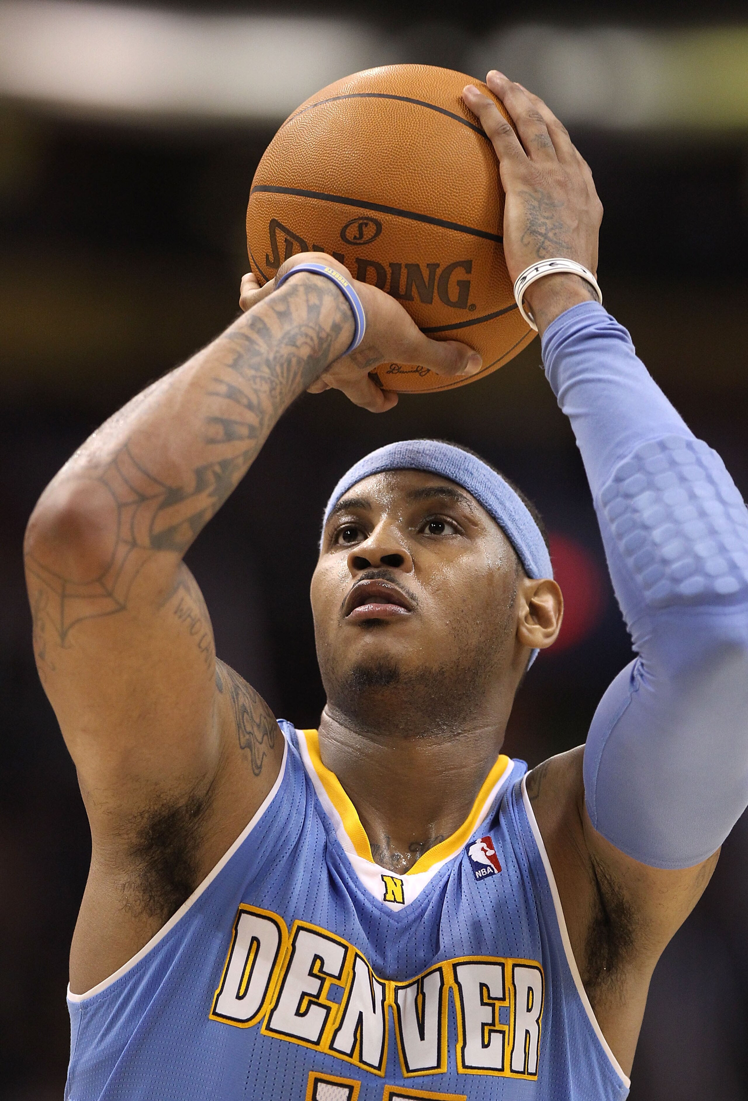 PHOENIX - NOVEMBER 15: Carmelo Anthony #15 of the Denver Nuggets shoots a free throw shot during the NBA game against the Phoenix Suns at US Airways Center on November 15, 2010 in Phoenix, Arizona. The Suns defeated the Nuggets 100-94. NOTE TO USER: Us PHOENIX - NOVEMBER 15: Carmelo Anthony #15 of the Denver Nuggets shoots a free throw shot during the NBA game against the Phoenix Suns at US Airways Center on November 15, 2010 in Phoenix, Arizona. The Suns defeated the Nuggets 100-94. NOTE TO USER: Us
