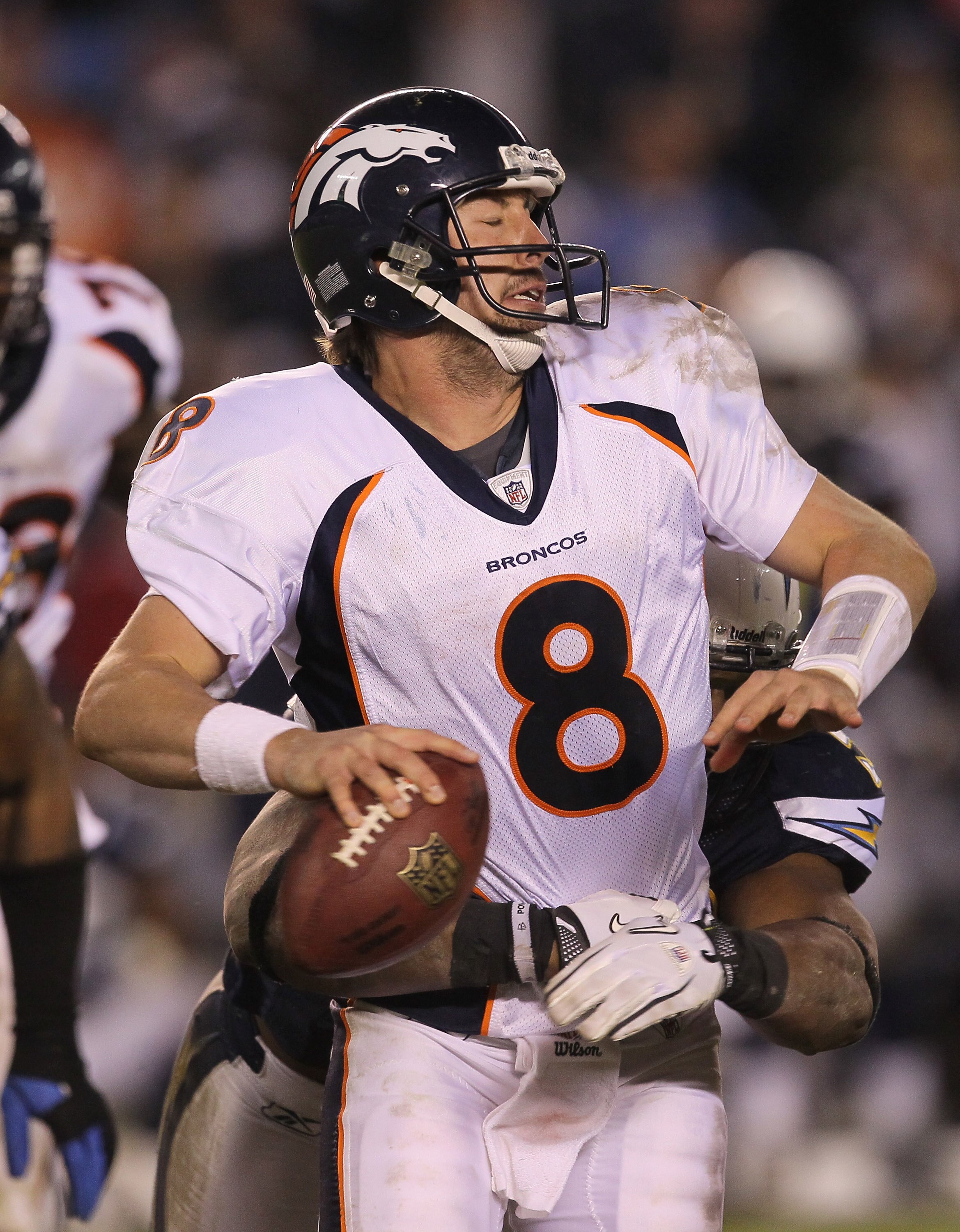 SAN DIEGO - NOVEMBER 22:  Quarterback Kyle Orton #8 of the Denver Broncos is sacked by linebacker Larry English #52 of the San Diego Chargers at Qualcomm Stadium on November 22, 2010 in San Diego, California.  (Photo by Stephen Dunn/Getty Images)