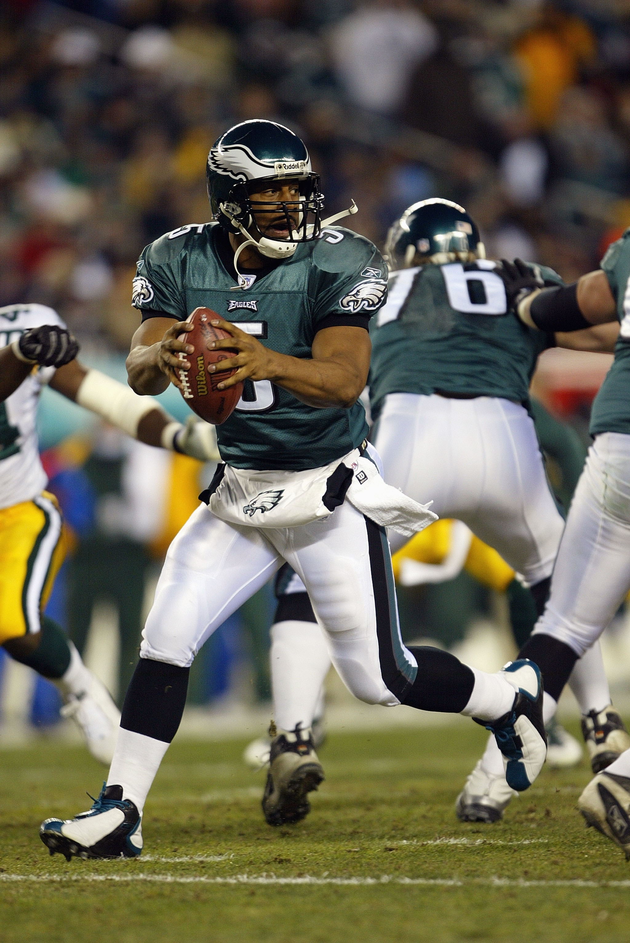 PHILADELPHIA - JANUARY 11:  Quarterback Donovan McNabb #5 of the Philadelphia Eagles drops back to pass during the game against the Green Bay Packers in the NFC divisional playoffs on January 11, 2004 at Lincoln Financial Field in Philadelphia, Pennsylvan