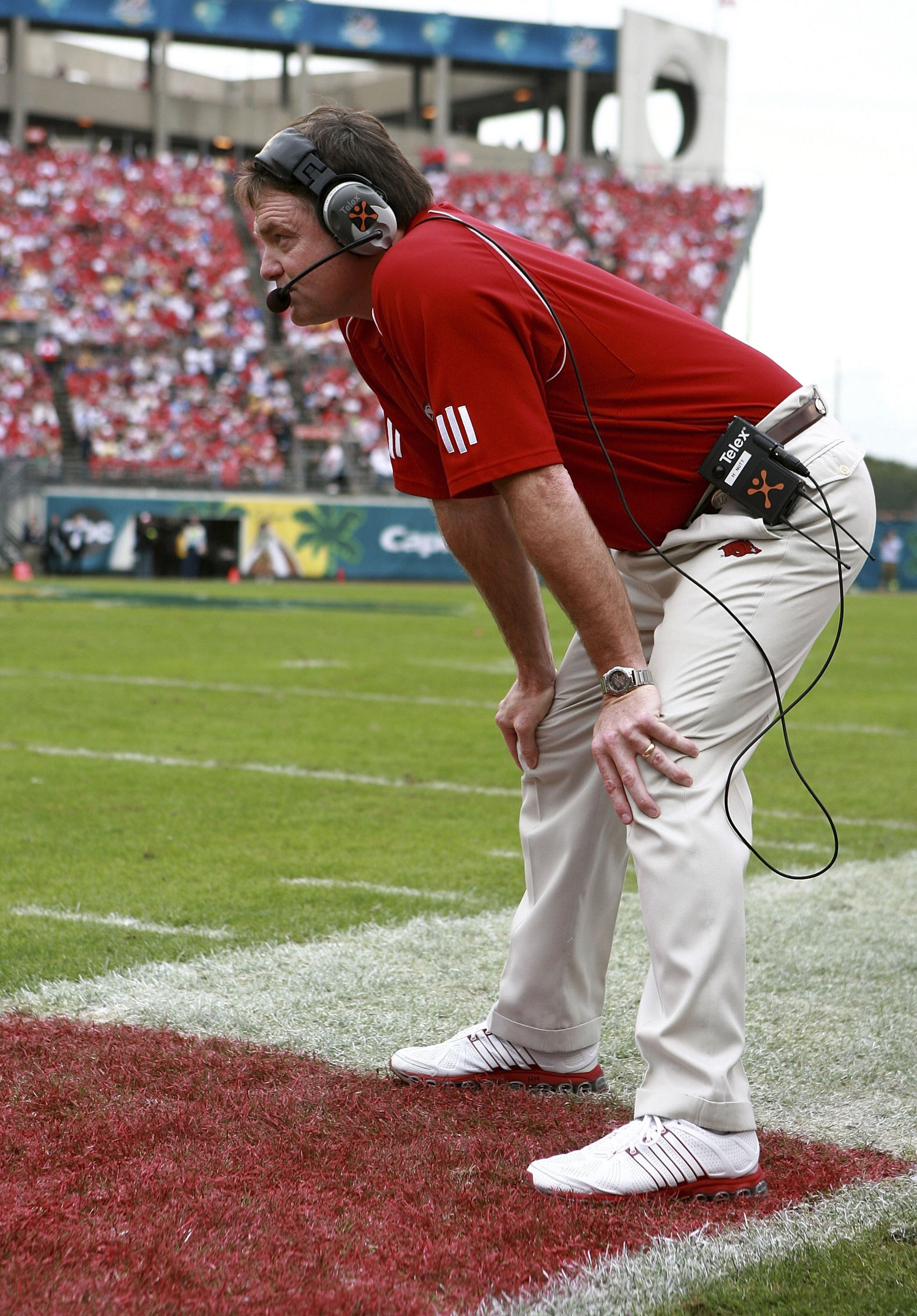ORLANDO, FL - JANUARY 1: Head coach Houston Nutt of the Arkansas Razorbacks watches his team play the Wisconsin Badgers in the Capitol One Bowl at Florida Citrus Bowl January 1, 2007 in Orlando, Florida. Wisconsin defeated Arkansas 17-14. (Photo by Doug ORLANDO, FL - JANUARY 1: Head coach Houston Nutt of the Arkansas Razorbacks watches his team play the Wisconsin Badgers in the Capitol One Bowl at Florida Citrus Bowl January 1, 2007 in Orlando, Florida. Wisconsin defeated Arkansas 17-14. (Photo by Doug