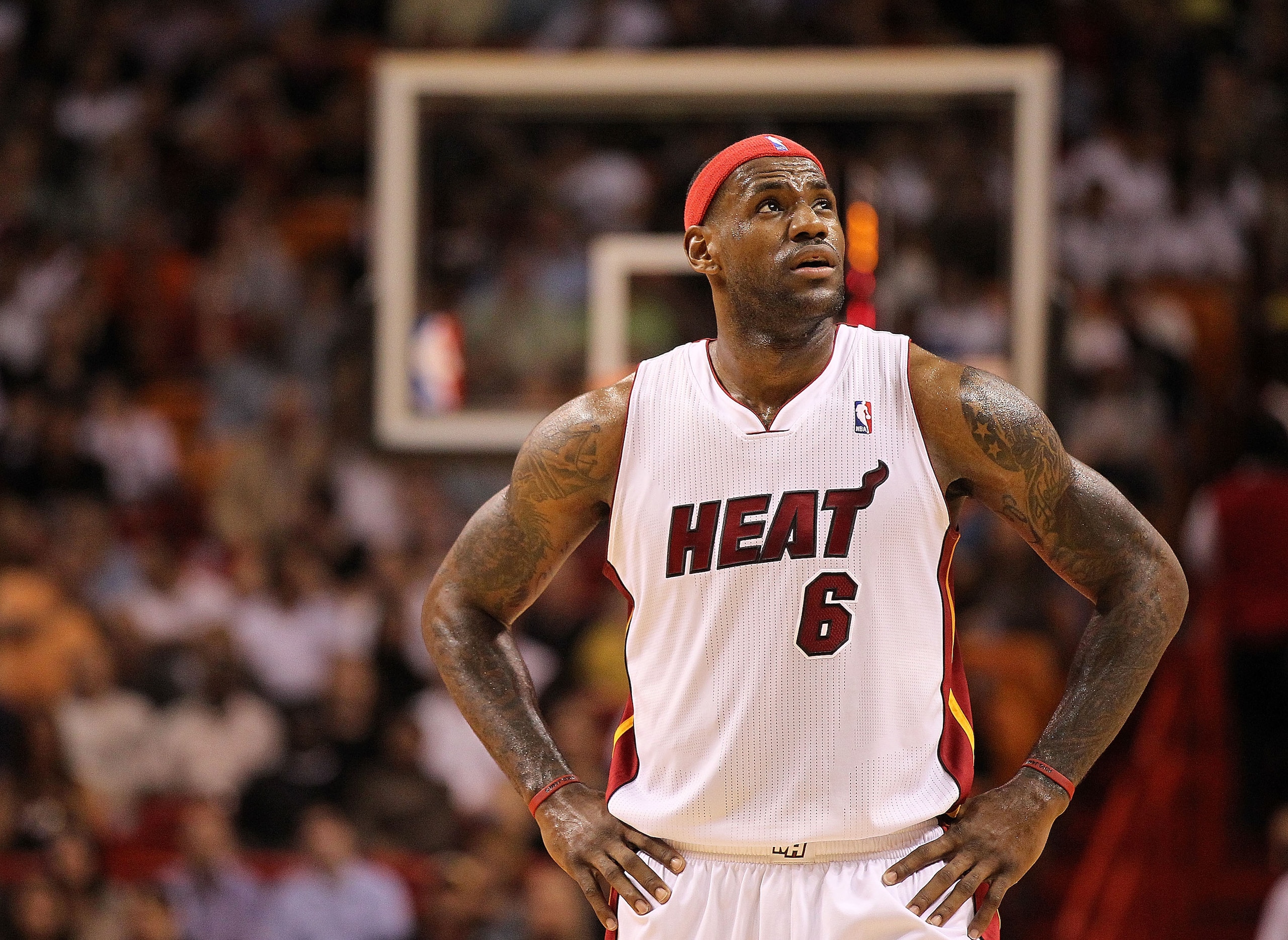 MIAMI, FL - DECEMBER 01: LeBron James #6 of the Miami Heat looks on during a game against the Detroit Pistons at American Airlines Arena on December 1, 2010 in Miami, Florida. NOTE TO USER: User expressly acknowledges and agrees that, by downloading and/o