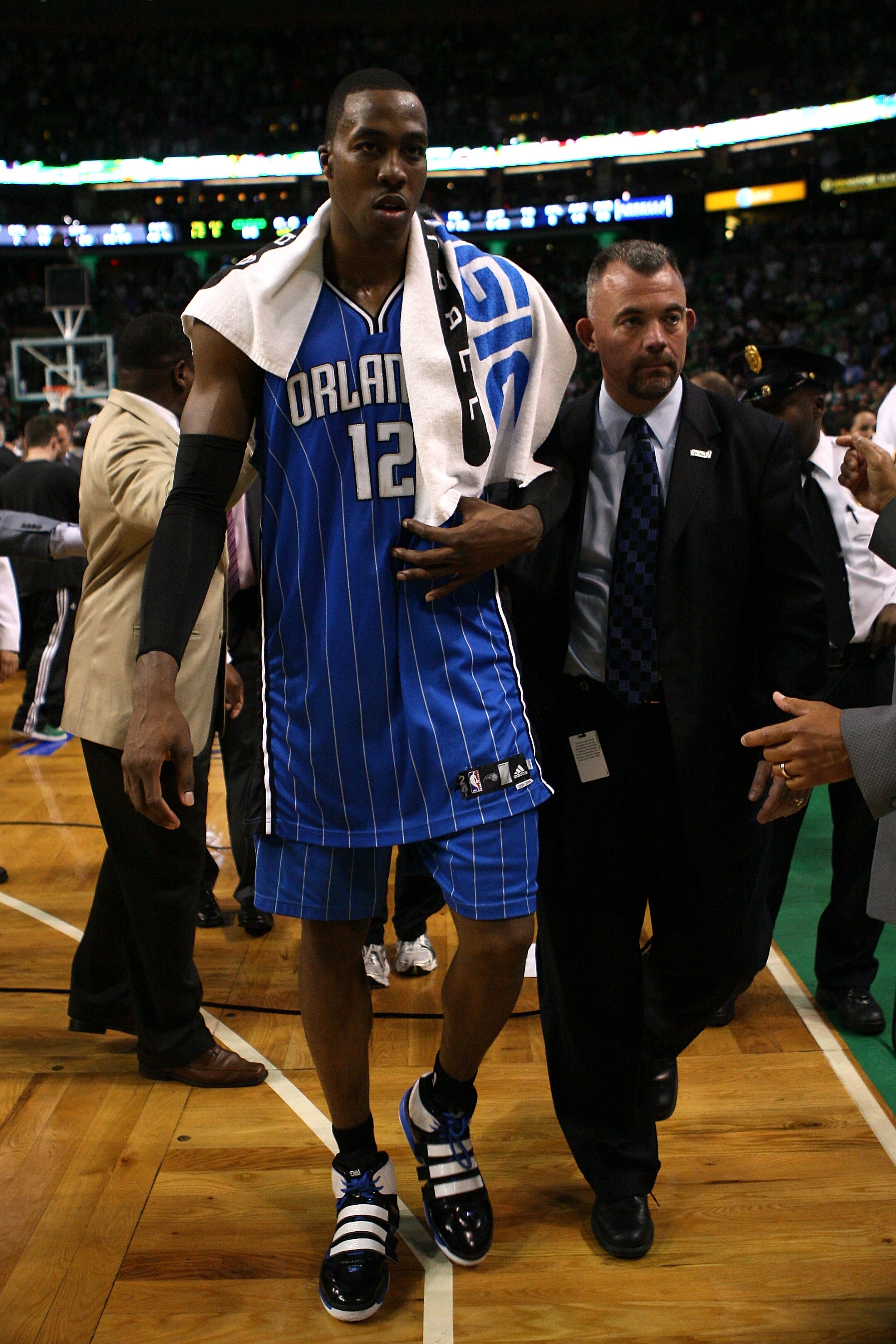 BOSTON - MAY 28:  Dwight Howard #12 of the Orlando Magic walks off the court dejected after the Magic lost 96-84 against the Boston Celtics in Game Six of the Eastern Conference Finals during the 2010 NBA Playoffs at TD Garden on May 28, 2010 in Boston, M