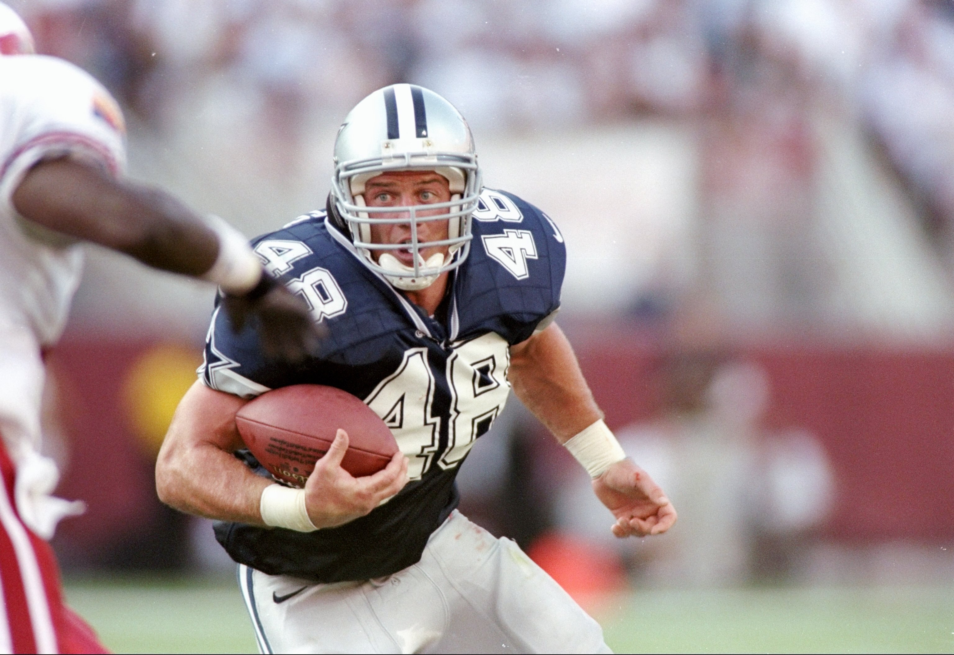 7 Sep 1997:  Running back Daryl Johnston #48 of the Dallas Cowboys carries the football during the Cowboys 25-22 loss to the Arizona Cardinals at Sun Devil Stadium in Tempe, Arizona. Mandatory Credit: Jed Jacobsohn  /Allsport