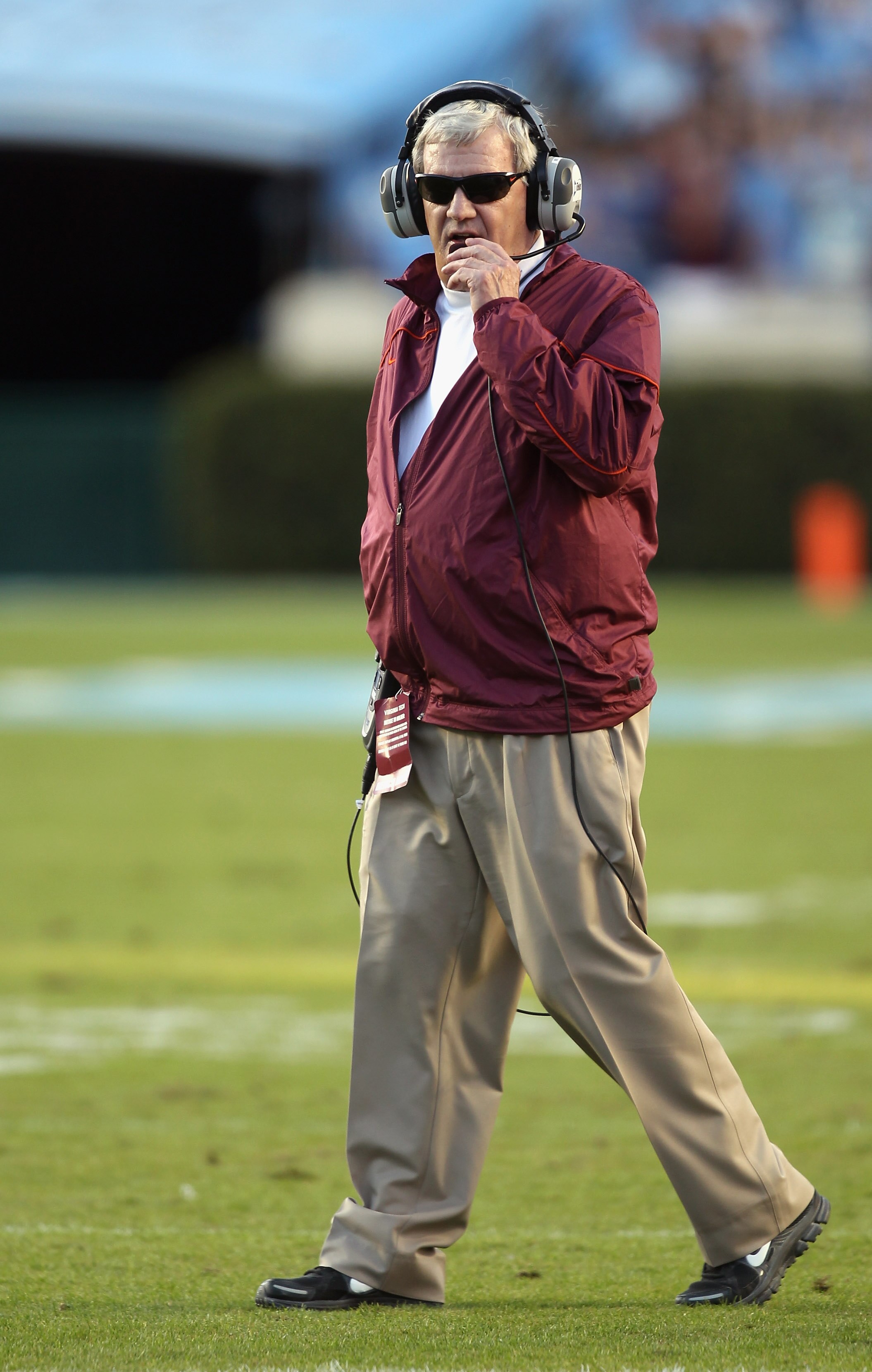 CHAPEL HILL, NC - NOVEMBER 13:  Head coach Frank Beamer of the Virginia Tech Hokies walk onto the field against the North Carolina Tar Heels during their game at Kenan Stadium on November 13, 2010 in Chapel Hill, North Carolina.  (Photo by Streeter Lecka/