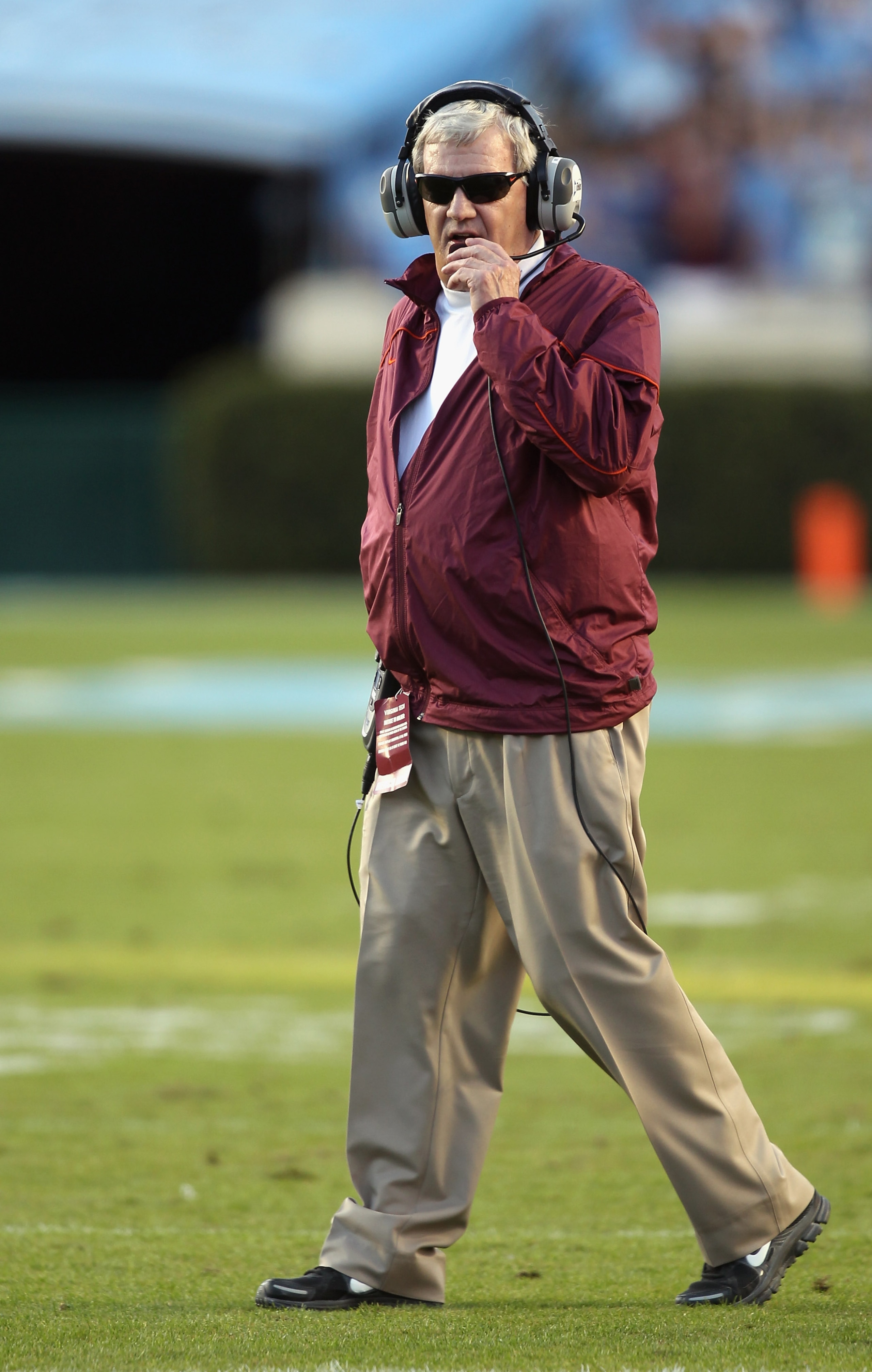 CHAPEL HILL, NC - NOVEMBER 13:  Head coach Frank Beamer of the Virginia Tech Hokies walk onto the field against the North Carolina Tar Heels during their game at Kenan Stadium on November 13, 2010 in Chapel Hill, North Carolina.  (Photo by Streeter Lecka/