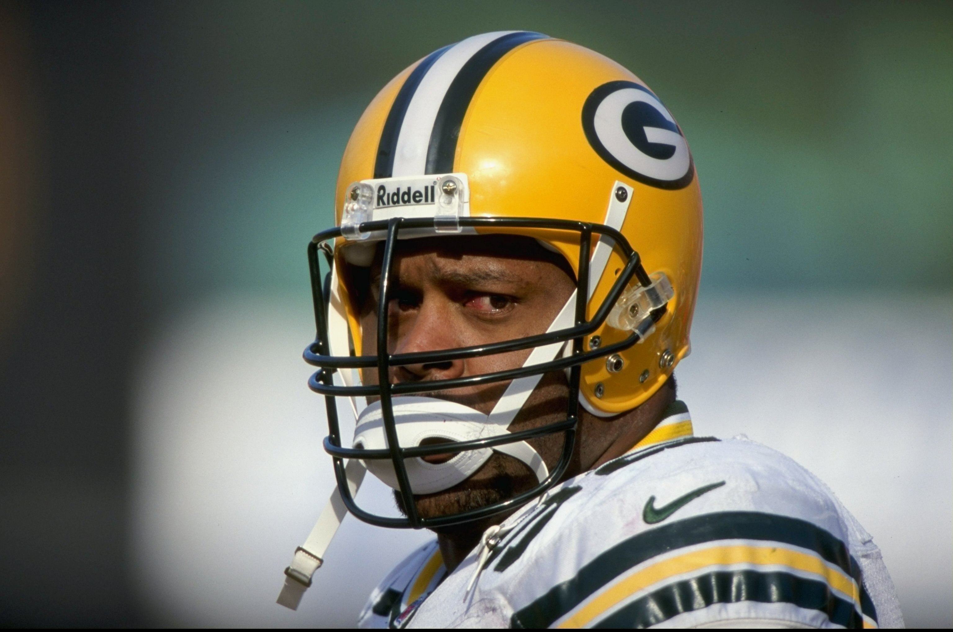 3 Jan 1999: Reggie White #42 of the Green Bay Packers looks on during the NFC Wild Card Game against the San Francisco 49ers at the 3Com Park in San Francisco, California. The 49ers defeated the Packers 30-27. Mandatory Credit: Todd Warshaw  /Allsport