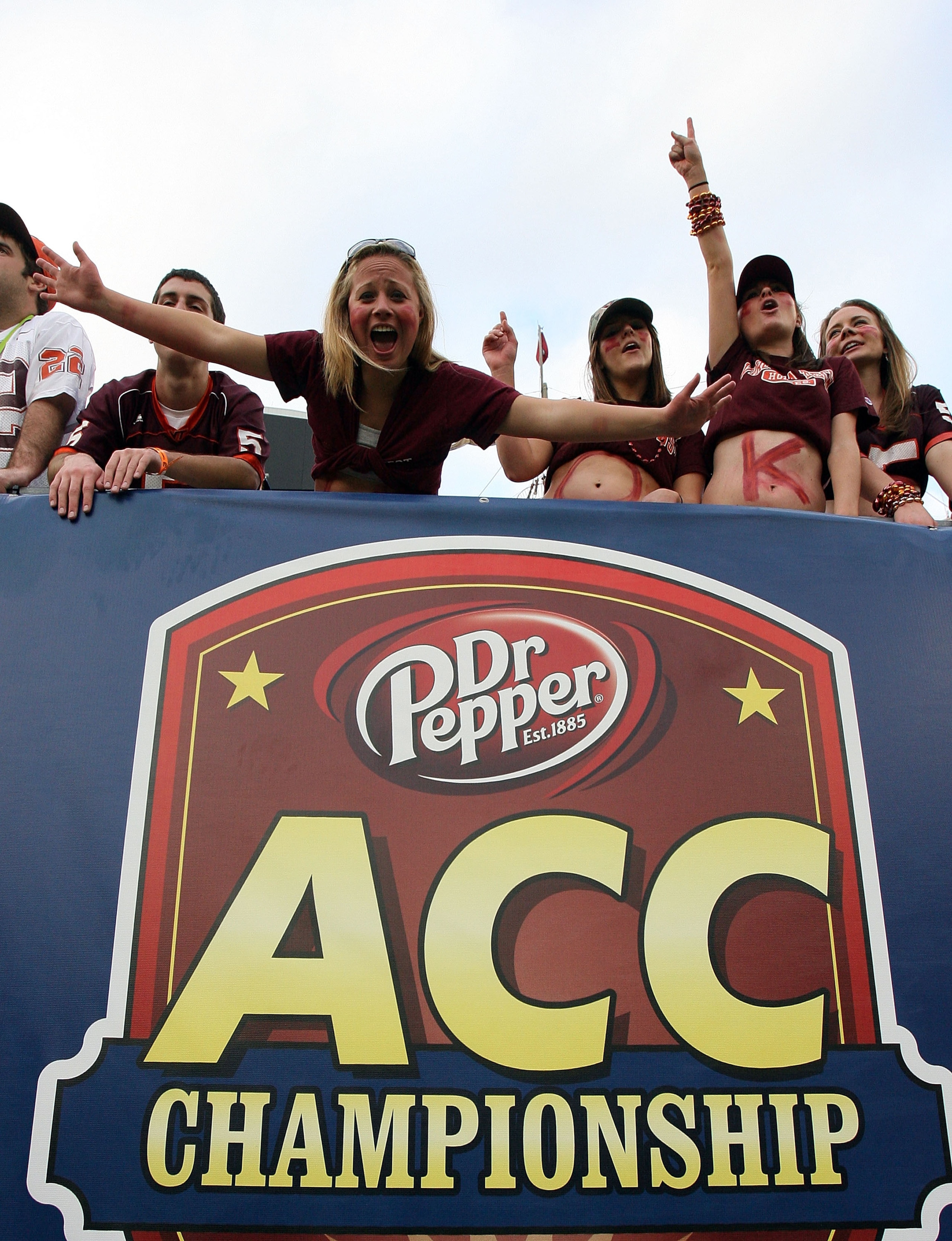 TAMPA, FL - DECEMBER 06:  Tech fans celebrate after the Virginia Tech Hokies score in the third quarter against the Boston College Eagles in the 2008 ACC Football Championship game at the Raymond James Stadium on December 6, 2008 in Tampa, Florida. Virgin