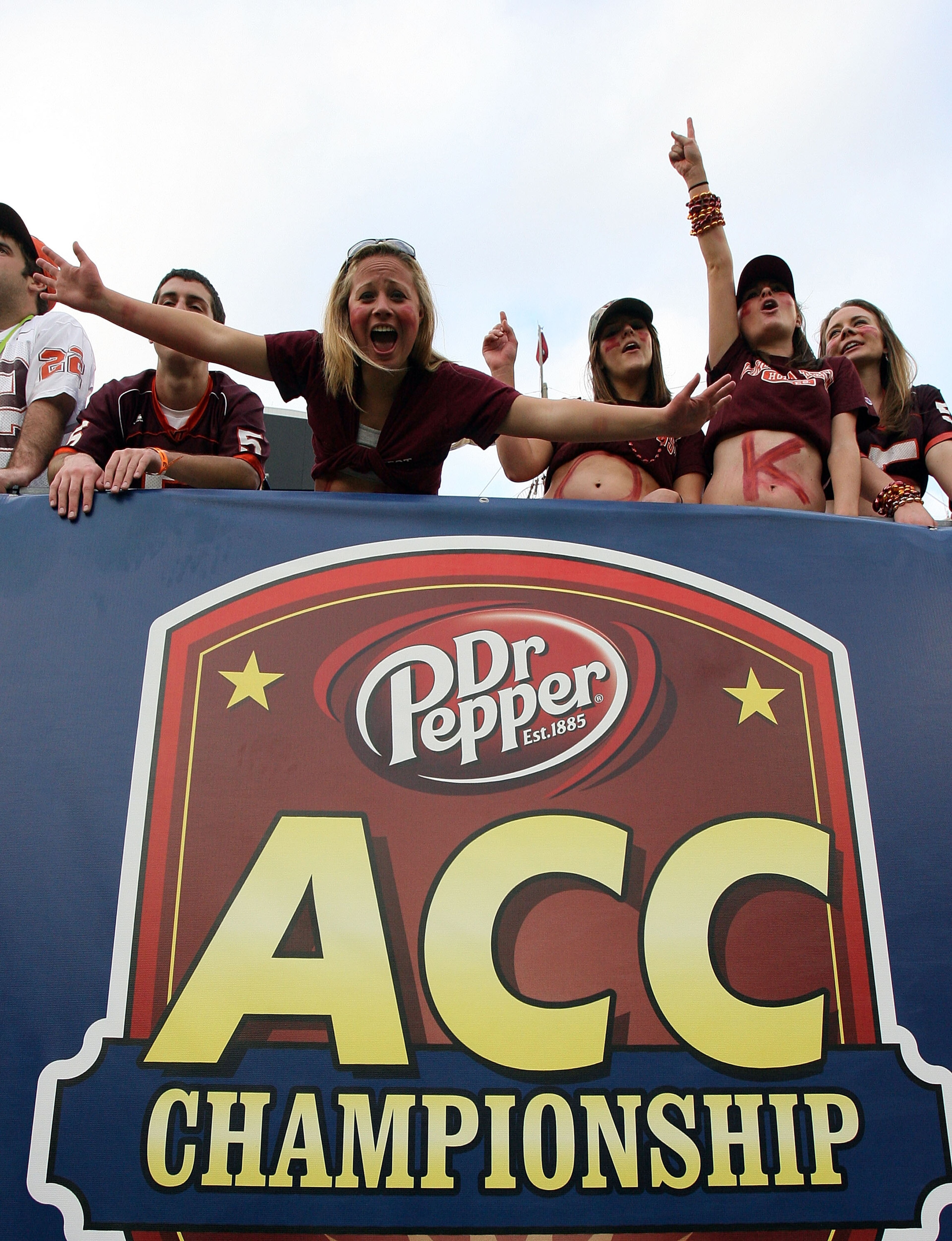 TAMPA, FL - DECEMBER 06:  Tech fans celebrate after the Virginia Tech Hokies score in the third quarter against the Boston College Eagles in the 2008 ACC Football Championship game at the Raymond James Stadium on December 6, 2008 in Tampa, Florida. Virgin