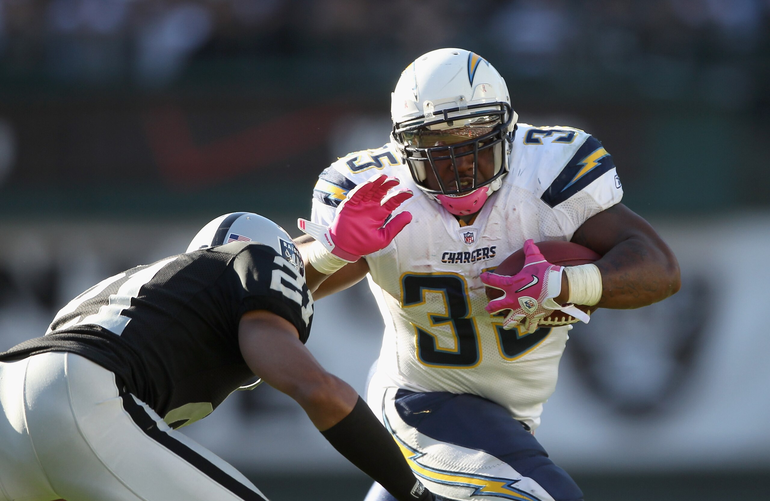 OAKLAND, CA - OCTOBER 10:  Mike Tolbert #35 of the San Diego Chargers runs with the ball during their game against the Oakland Raiders at Oakland-Alameda County Coliseum on October 10, 2010 in Oakland, California.  (Photo by Ezra Shaw/Getty Images)