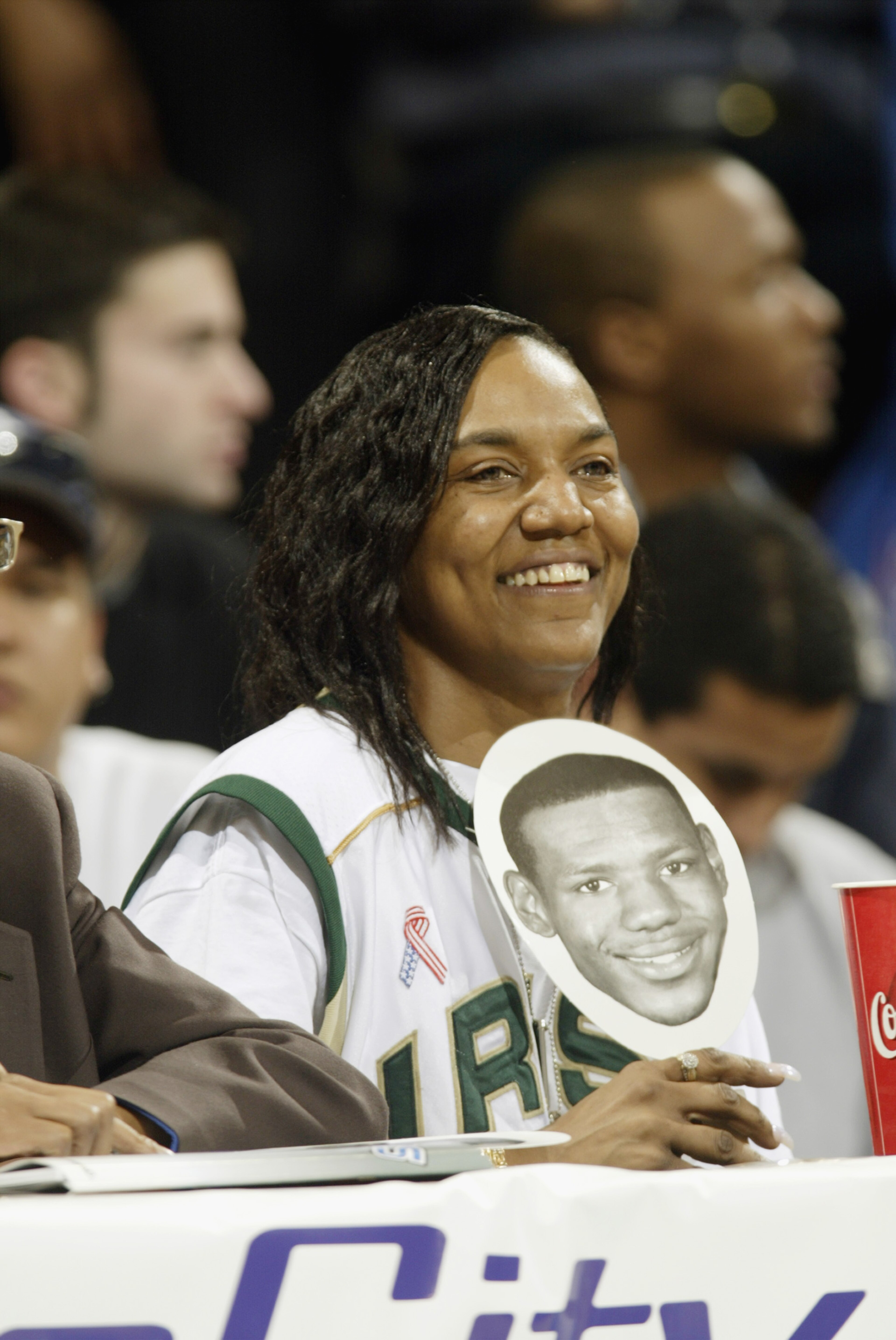 LOS ANGELES - JANUARY 4: Gloria James, mother of LeBron James #23 of St. Vincent-St. Mary's High School, watches her son play against Mater Dei High School during the Ninth Annual Pangos Dream Classic game at UCLA's Pauley Pavilion on January 4, 2003 in LOS ANGELES - JANUARY 4: Gloria James, mother of LeBron James #23 of St. Vincent-St. Mary's High School, watches her son play against Mater Dei High School during the Ninth Annual Pangos Dream Classic game at UCLA's Pauley Pavilion on January 4, 2003 in
