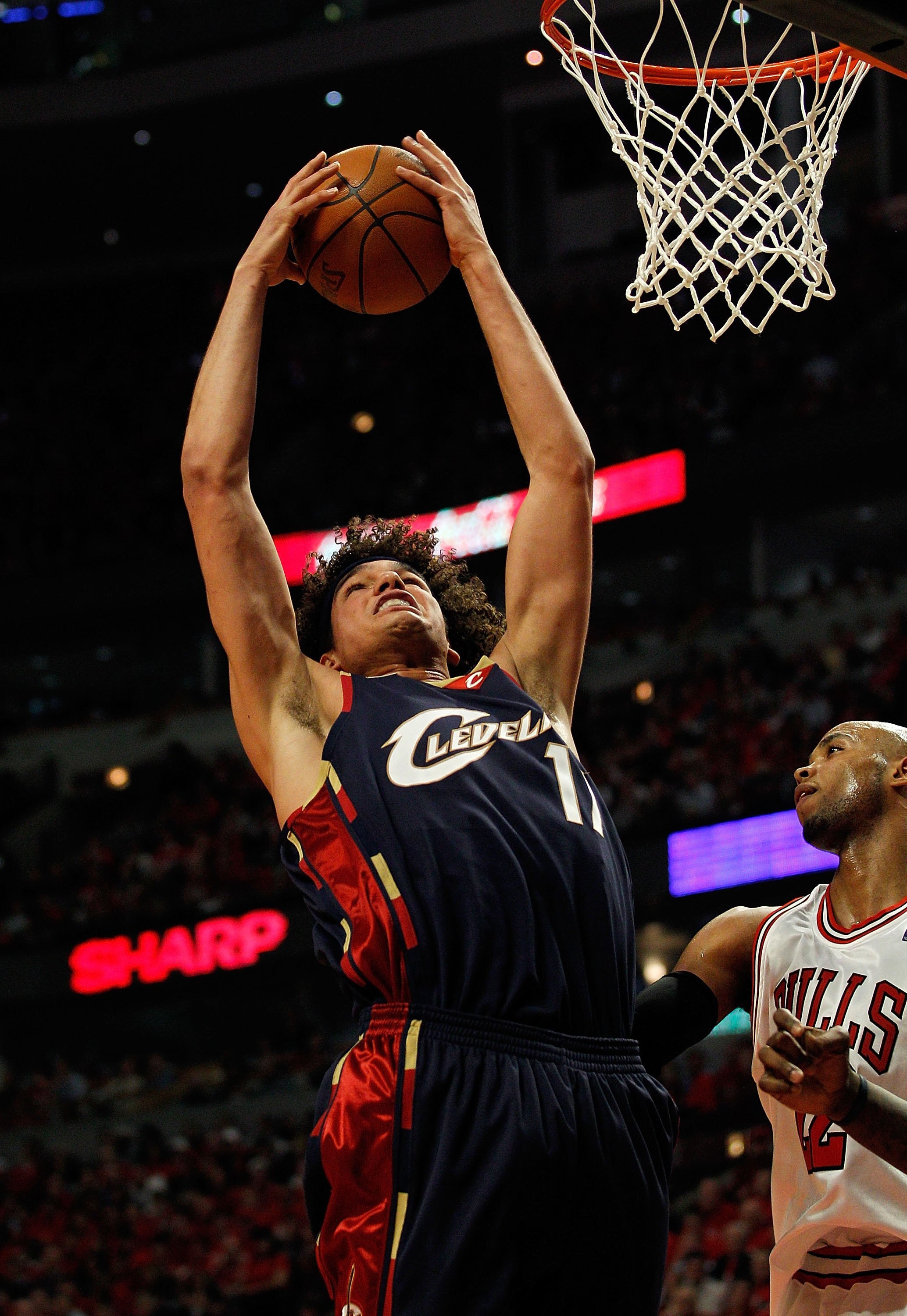 CHICAGO - APRIL 22: Anderson Varejao #17 of the Cleveland Cavaliers grabs a rebound over Taj Gibson #22 of the Chicago Bulls in Game Three of the Eastern Conference Quarterfinals during the 2010 NBA Playoffs at the United Center on April 22, 2010 in Chica