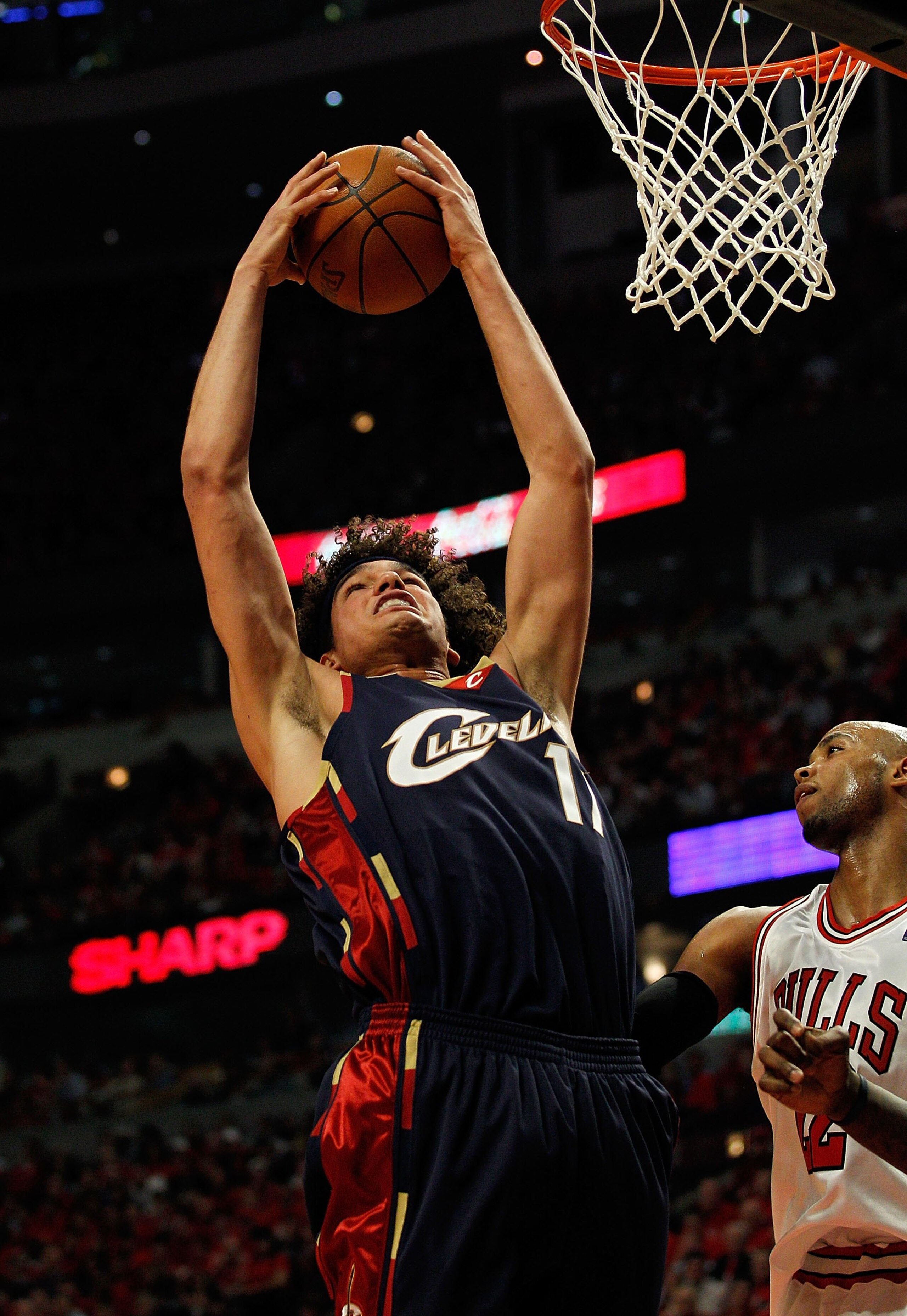 CHICAGO - APRIL 22: Anderson Varejao #17 of the Cleveland Cavaliers grabs a rebound over Taj Gibson #22 of the Chicago Bulls in Game Three of the Eastern Conference Quarterfinals during the 2010 NBA Playoffs at the United Center on April 22, 2010 in Chica CHICAGO - APRIL 22: Anderson Varejao #17 of the Cleveland Cavaliers grabs a rebound over Taj Gibson #22 of the Chicago Bulls in Game Three of the Eastern Conference Quarterfinals during the 2010 NBA Playoffs at the United Center on April 22, 2010 in Chica