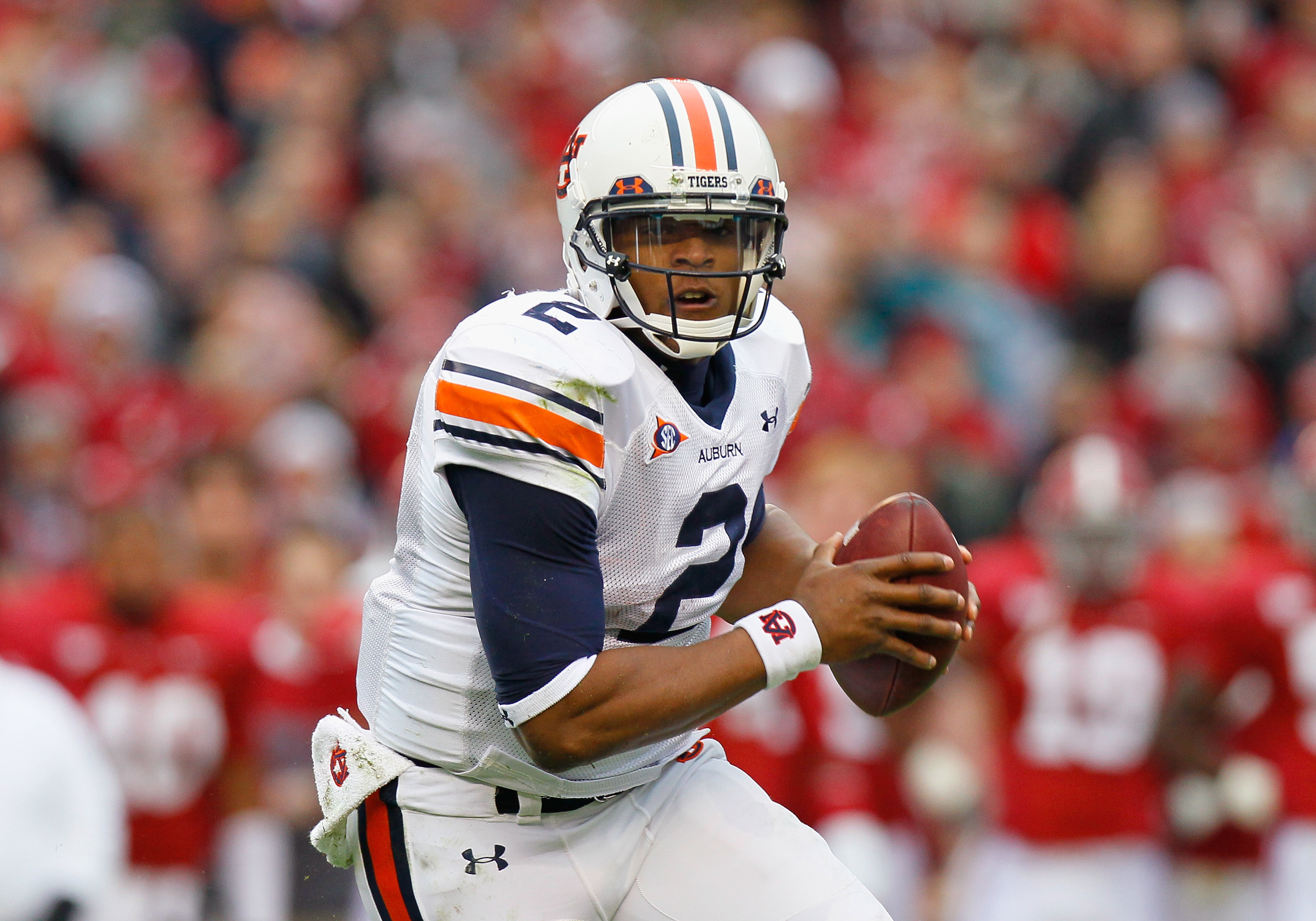 TUSCALOOSA, AL - NOVEMBER 26:  Quarterback Cam Newton #2 of the Auburn Tigers rushes out of the pocket against the Alabama Crimson Tide at Bryant-Denny Stadium on November 26, 2010 in Tuscaloosa, Alabama.  (Photo by Kevin C. Cox/Getty Images)