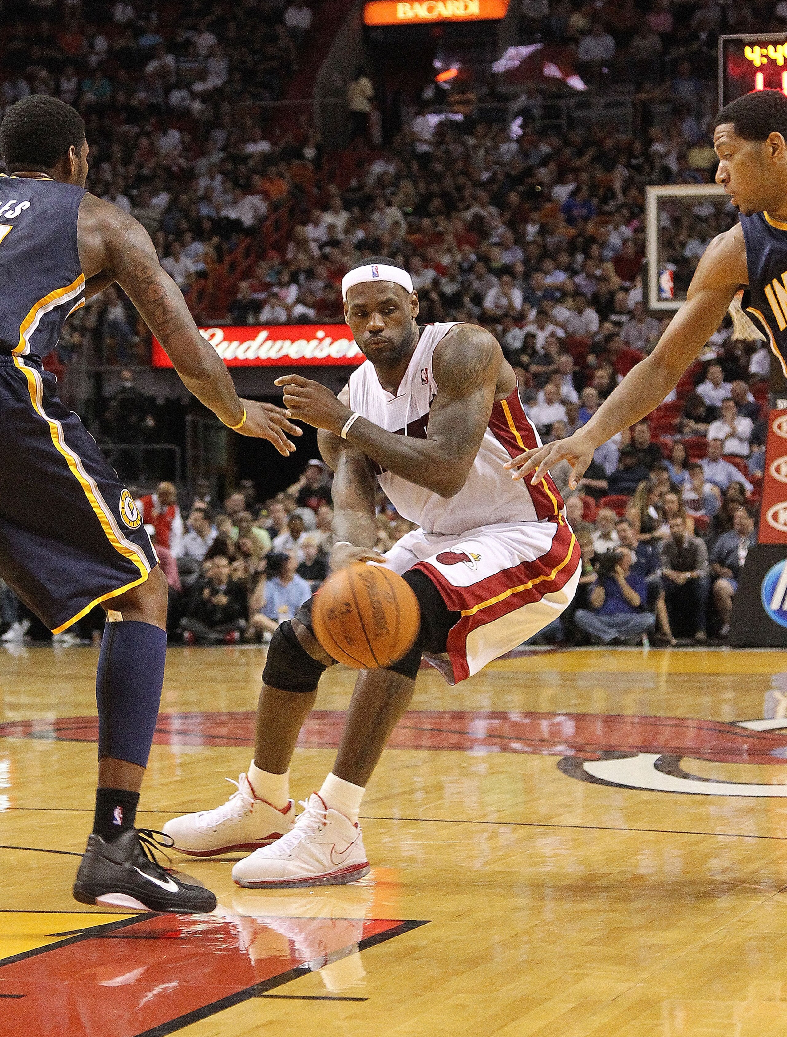 MIAMI - NOVEMBER 22: LeBron James #6 of the Miami Heat passes during a game against the Indiana Pacers at American Airlines Arena on November 22, 2010 in Miami, Florida. NOTE TO USER: User expressly acknowledges and agrees that, by downloading and/or usi MIAMI - NOVEMBER 22: LeBron James #6 of the Miami Heat passes during a game against the Indiana Pacers at American Airlines Arena on November 22, 2010 in Miami, Florida. NOTE TO USER: User expressly acknowledges and agrees that, by downloading and/or usi