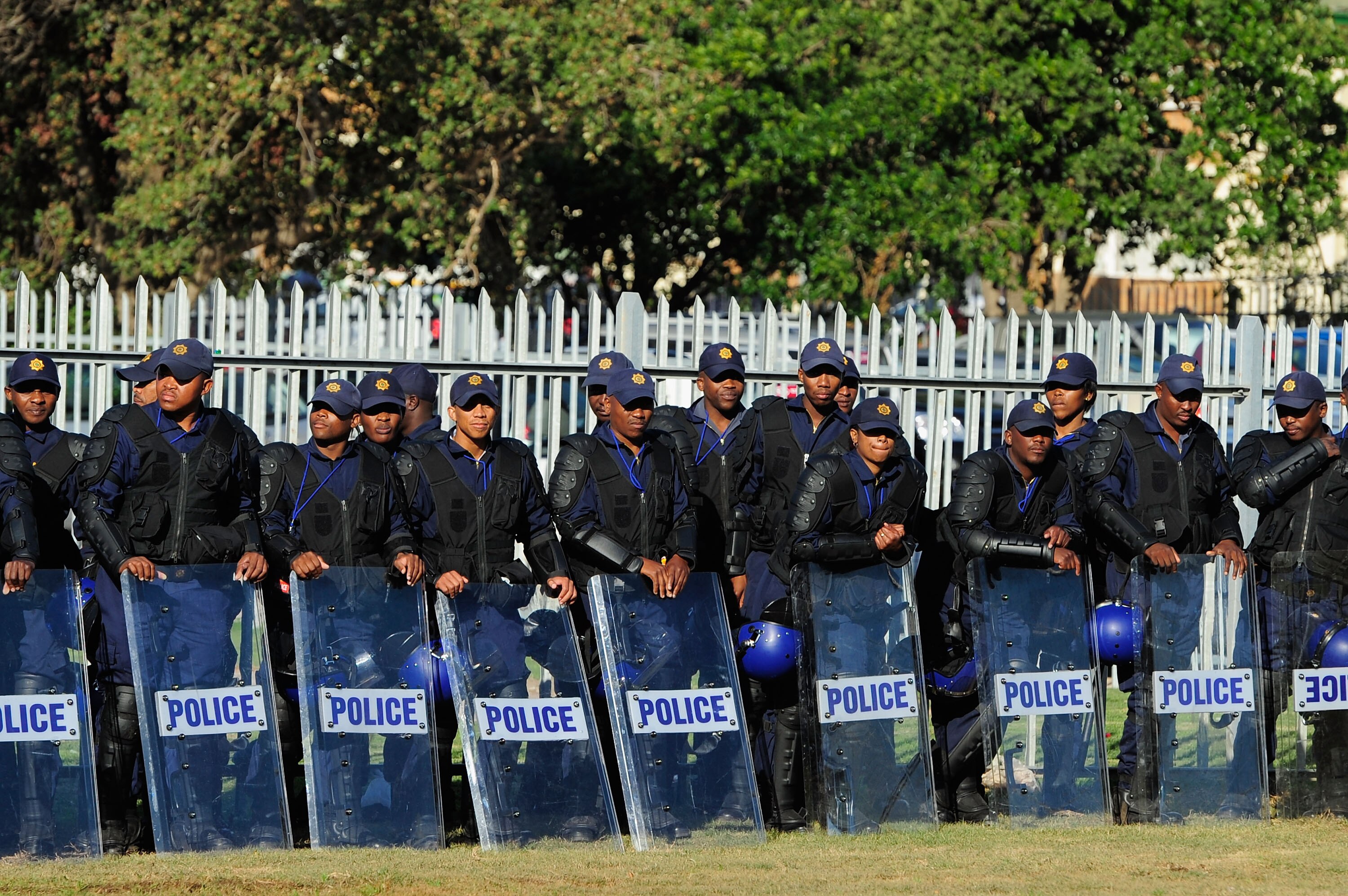PORT ELIZABETH, SOUTH AFRICA - JUNE 21: A line of security guards are pictured prior to the 2010 FIFA World Cup South Africa Group H match between Chile and Switzerland at Nelson Mandela Bay Stadium on June 21, 2010 in Port Elizabeth, South Africa.  (Phot