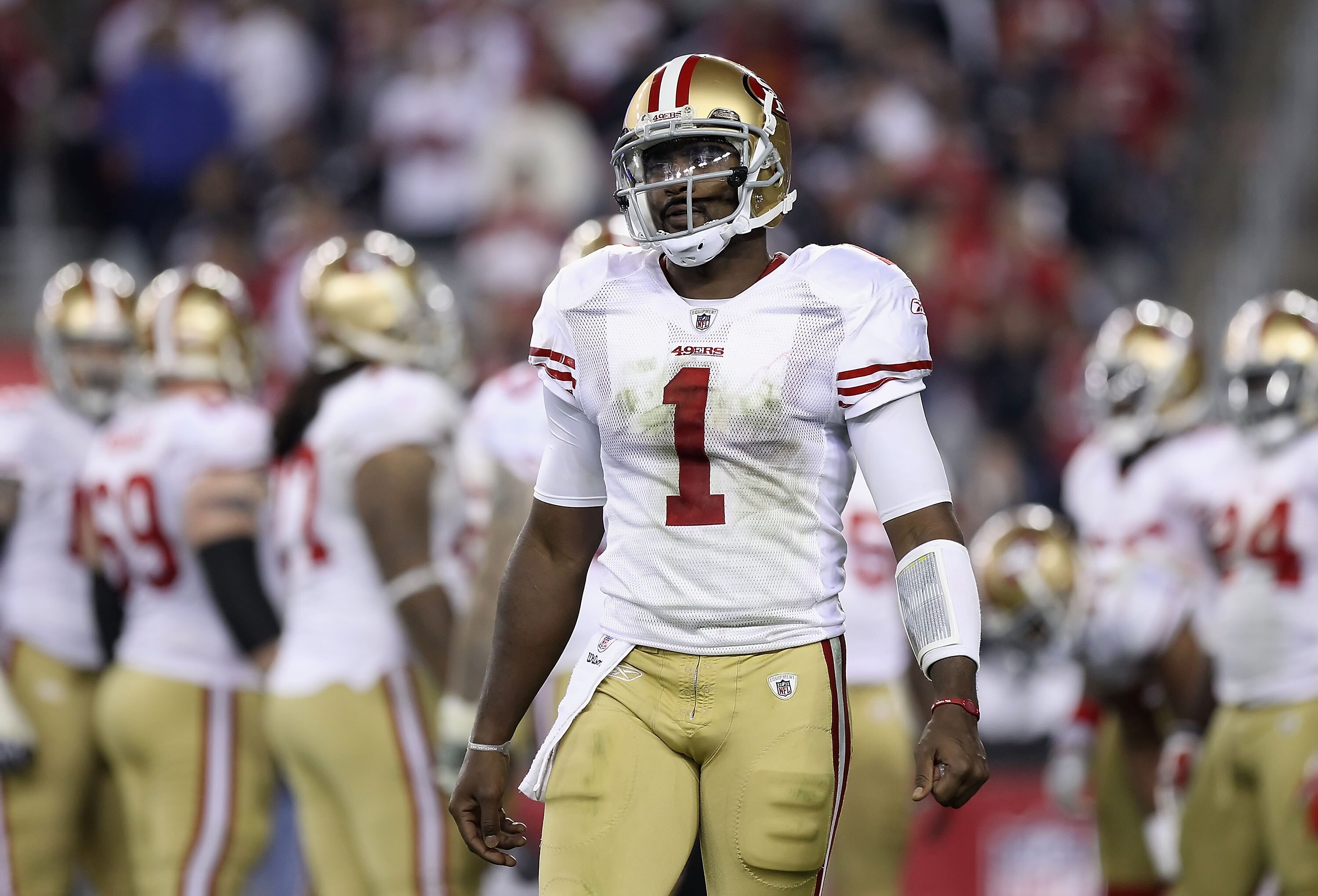 GLENDALE, AZ - NOVEMBER 29:  Quarterback Troy Smith #1 of the San Francisco 49ers looks to the sidelines during the NFL game against the Arizona Cardinals at the University of Phoenix Stadium on November 29, 2010 in Glendale, Arizona. The 49ers defeated t