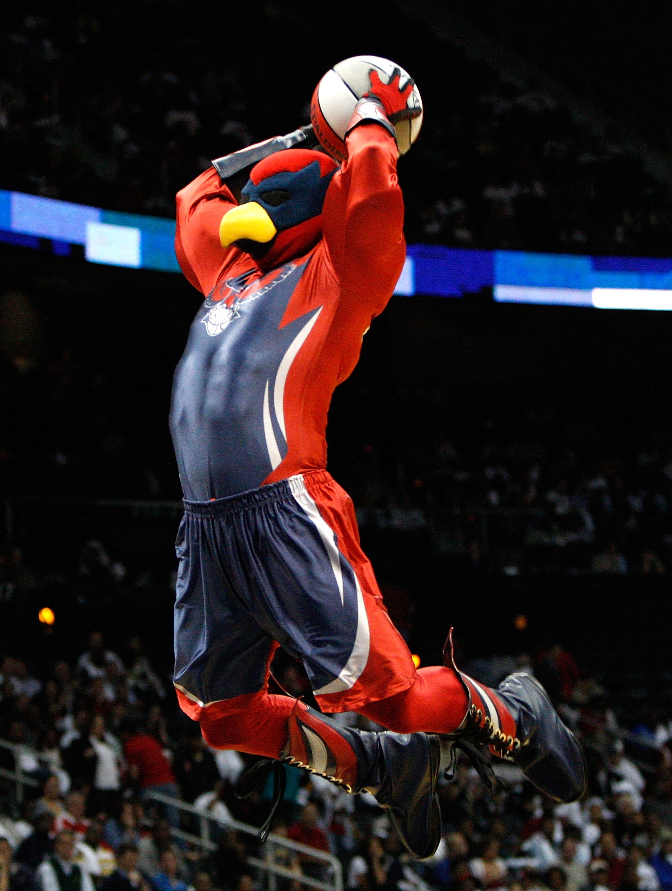 ATLANTA - OCTOBER 28:  SkyHawk, mascot of the Atlanta Hawks, dunks for the crowd during a timeout against the Indiana Pacers at Philips Arena on October 28, 2009 in Atlanta, Georgia.  (Photo by Kevin C. Cox/Getty Images)