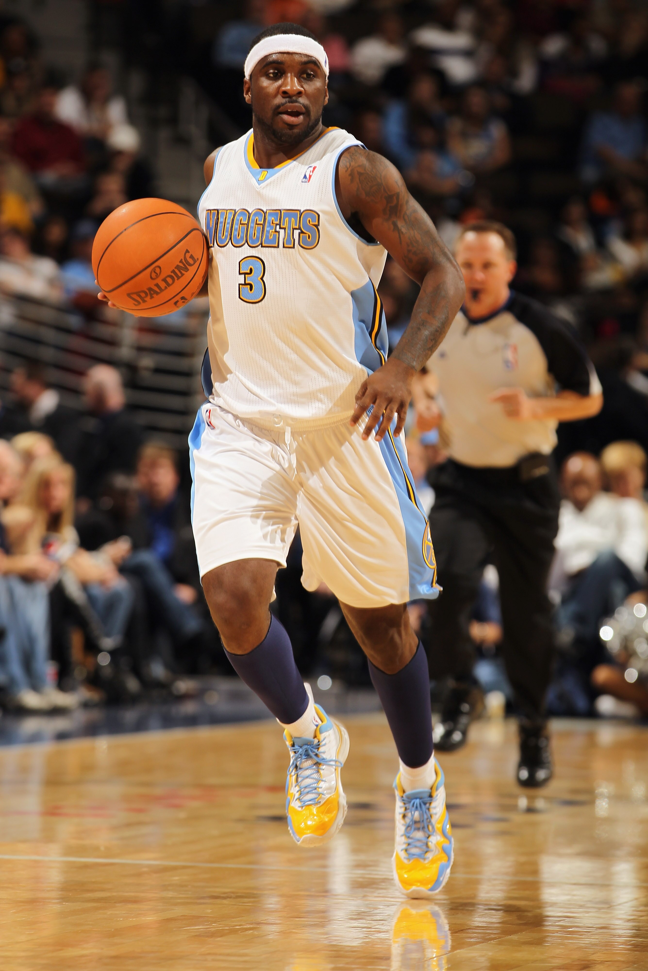DENVER - NOVEMBER 16:  Ty Lawson #3 of the Denver Nuggets dribbles the ball against the New York Knicks at the Pepsi Center on November 16, 2010 in Denver, Colorado. The Nuggets defeated the Knicks 120-118. NOTE TO USER: User expressly acknowledges and ag