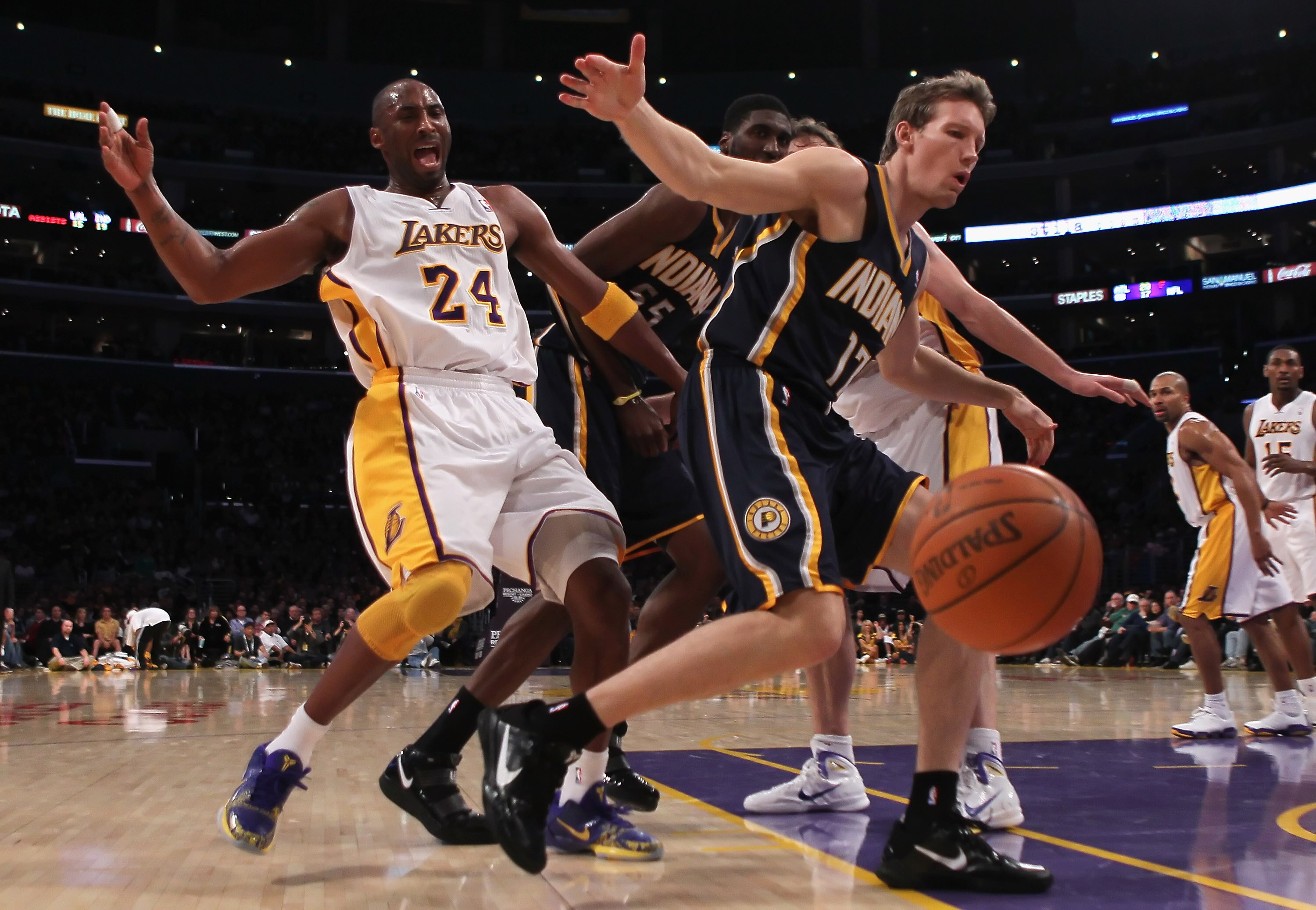 LOS ANGELES, CA - NOVEMBER 28:  Kobe Bryant #24 of the Los Angeles Lakers is fouled by Mike Dunleavy #17 of the Indiana Pacers during the third quarter at Staples Center on November 28, 2010 in Los Angeles, California. The Pacers defeated the Lakers 95-92