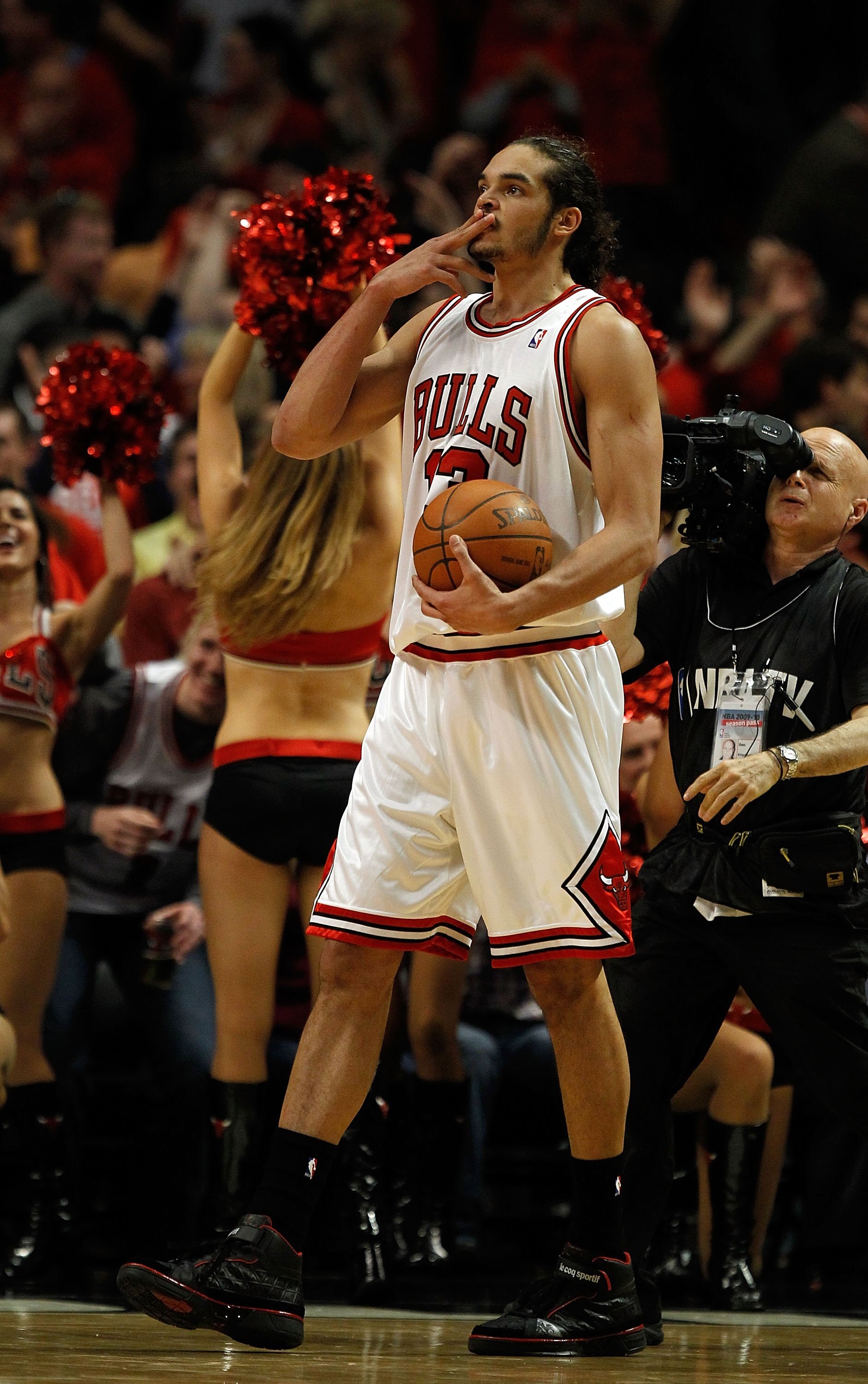 CHICAGO - APRIL 22: Joakim Noah #13 of the Chicago Bulls blows a kiss to fans as he celebrates a win over the Cleveland Cavaliers in Game Three of the Eastern Conference Quarterfinals during the 2010 NBA Playoffs at the United Center on April 22, 2010 in
