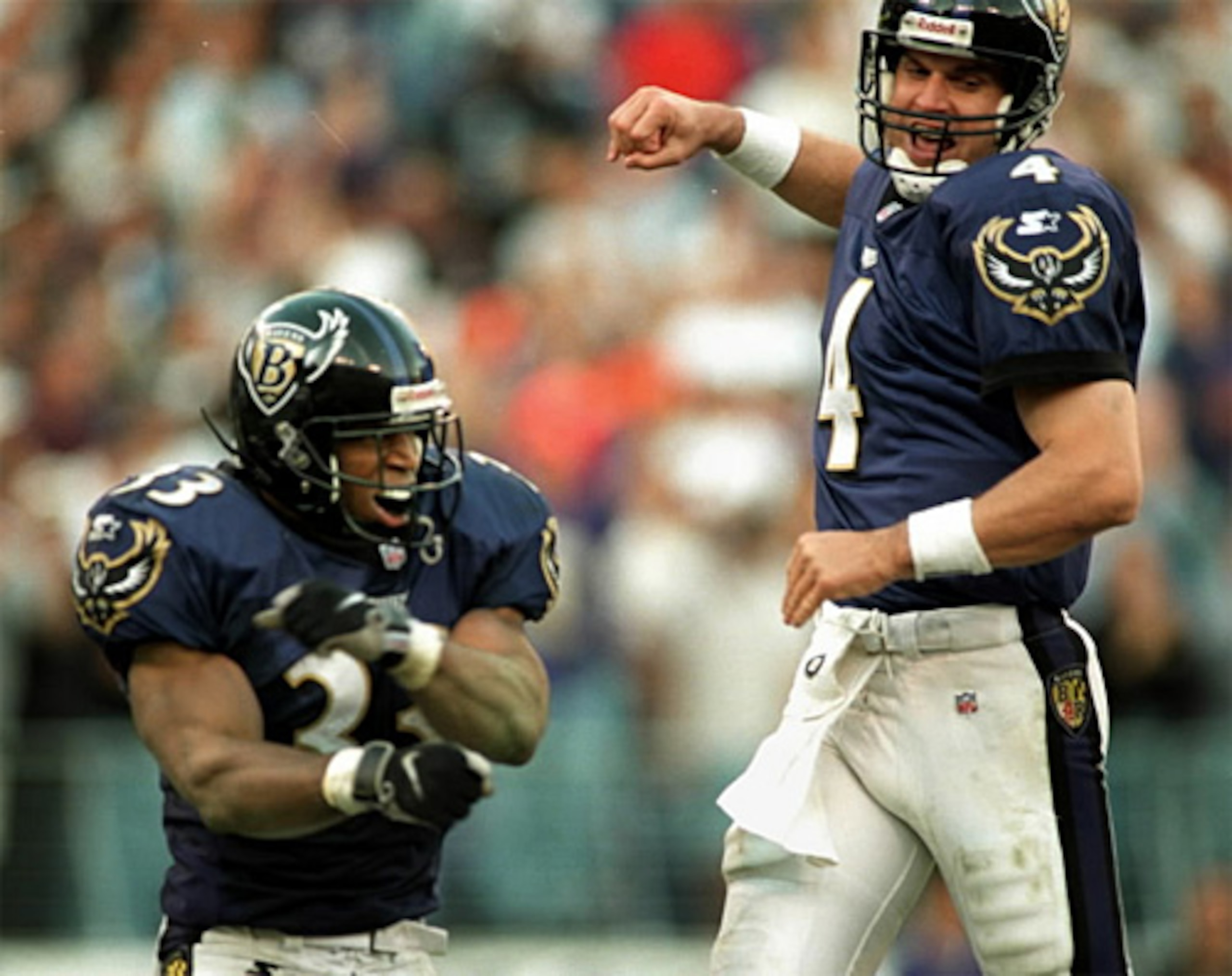 Jim Harbaugh and Priest Holmes celebrate winning touchdown over Colts