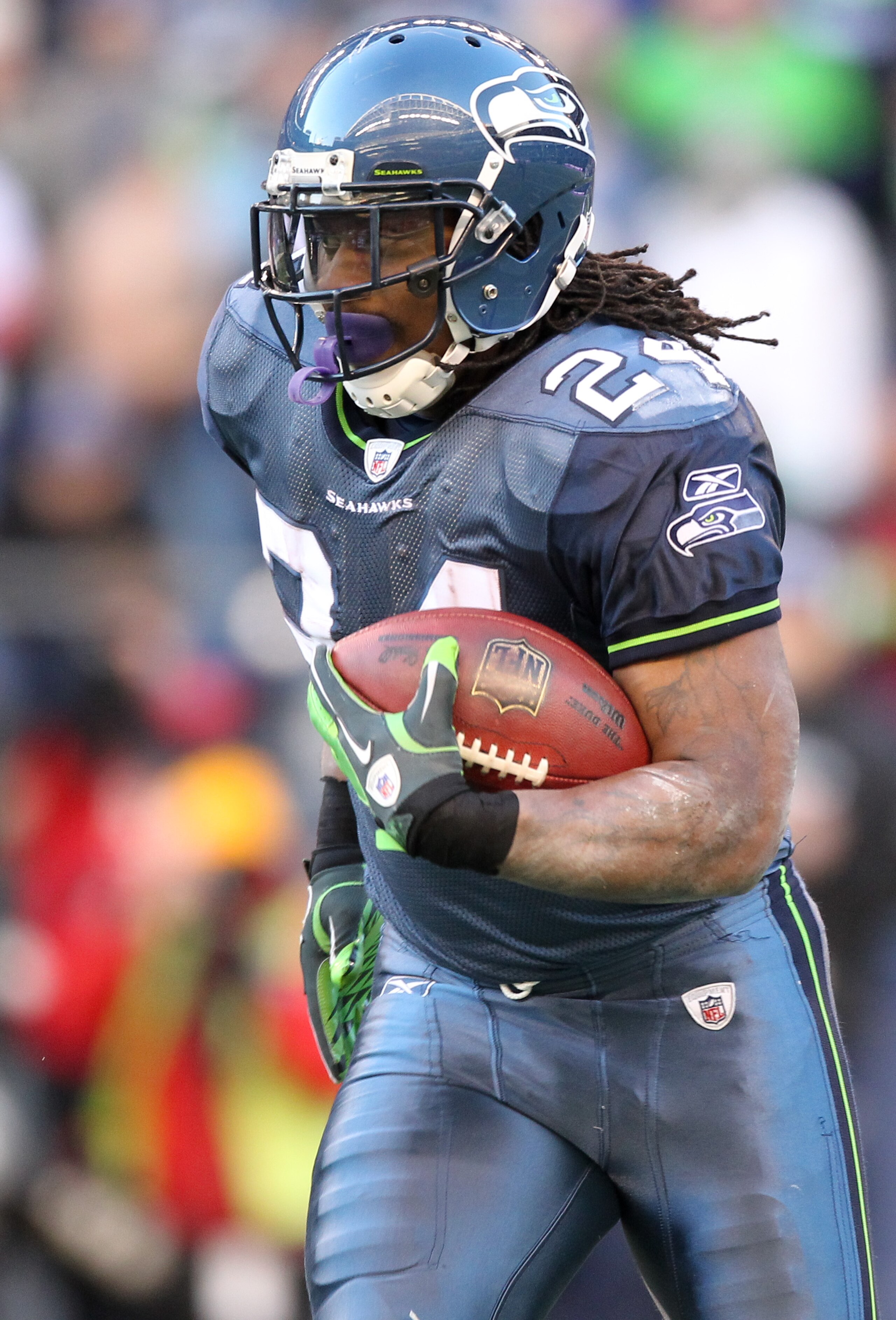 SEATTLE, WA - NOVEMBER 28: Running back Marshawn Lynch #24 of the Seattle Seahawks rushes against the Kansas City Chiefs at Qwest Field on November 28, 2010 in Seattle, Washington. (Photo by Otto Greule Jr/Getty Images) SEATTLE, WA - NOVEMBER 28: Running back Marshawn Lynch #24 of the Seattle Seahawks rushes against the Kansas City Chiefs at Qwest Field on November 28, 2010 in Seattle, Washington. (Photo by Otto Greule Jr/Getty Images)