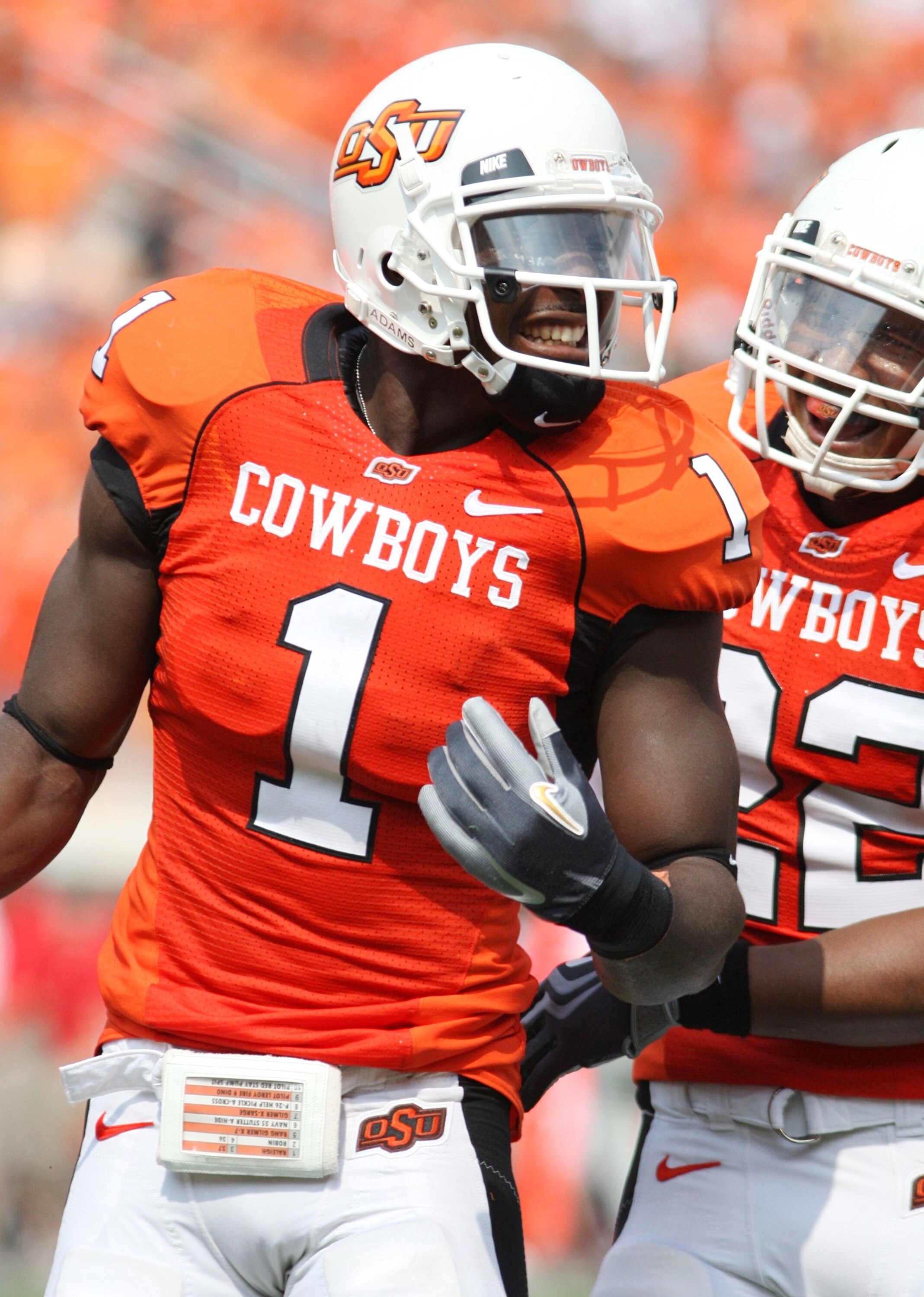 STILLWATER, OK - SEPTEMBER 5:  Wide receiver Dez Bryant #1 of the Oklahoma State Cowboys celebrates his touchdown with teammate Dexter Pratt #22 during the second quarter of the game against the Georgia Bulldogs at Boone Pickens Stadium on September 5, 20