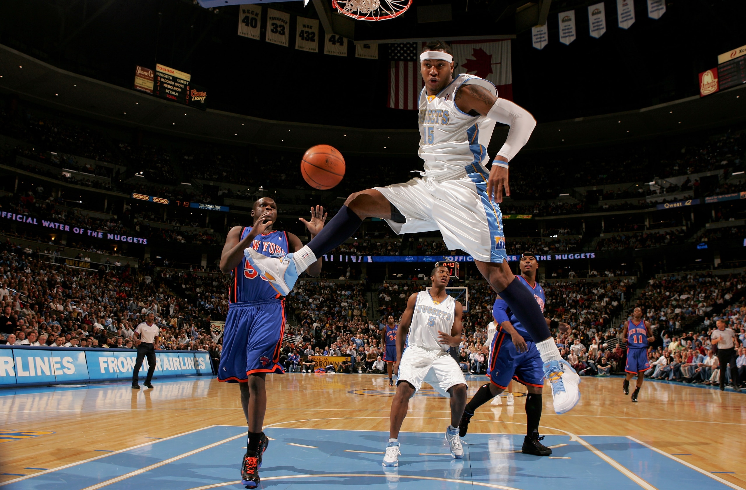 DENVER - NOVEMBER 17:  Carmelo Anthony #15 of the Denver Nuggets follows through as he dunks against the New York Knicks at the Pepsi Center November 17, 2007 in Denver, Colorado.  (Photo by Doug Pensinger/Getty Images)