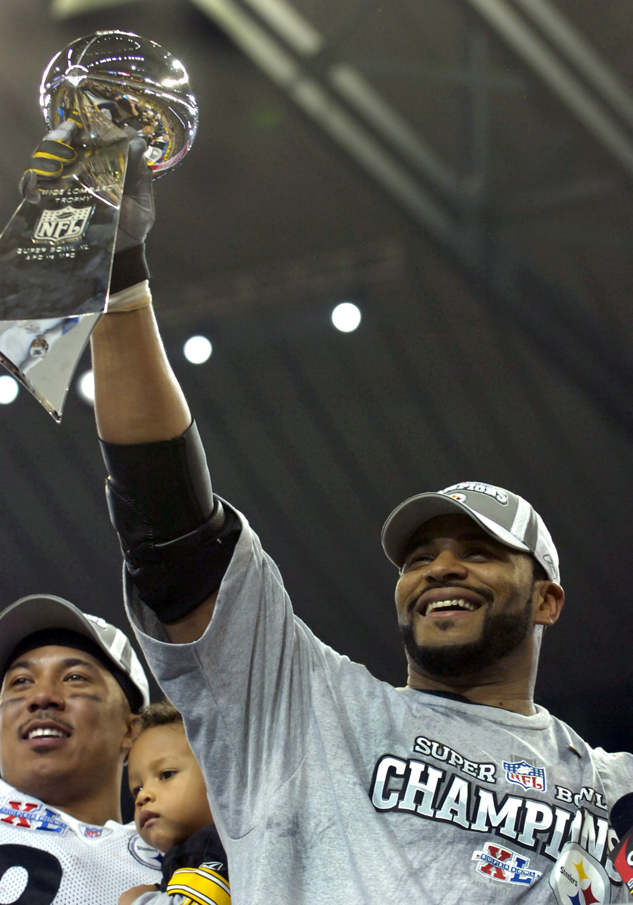 Pittsburgh Steeler Jerome Bettis celebrates with the Super Bowl Trophy after winning Super Bowl XL between the Pittsburgh Steelers and Seattle Seahawks at Ford Field in Detroit, Michigan on February 5, 2006. (Photo by A. Messerschmidt/Getty Images)