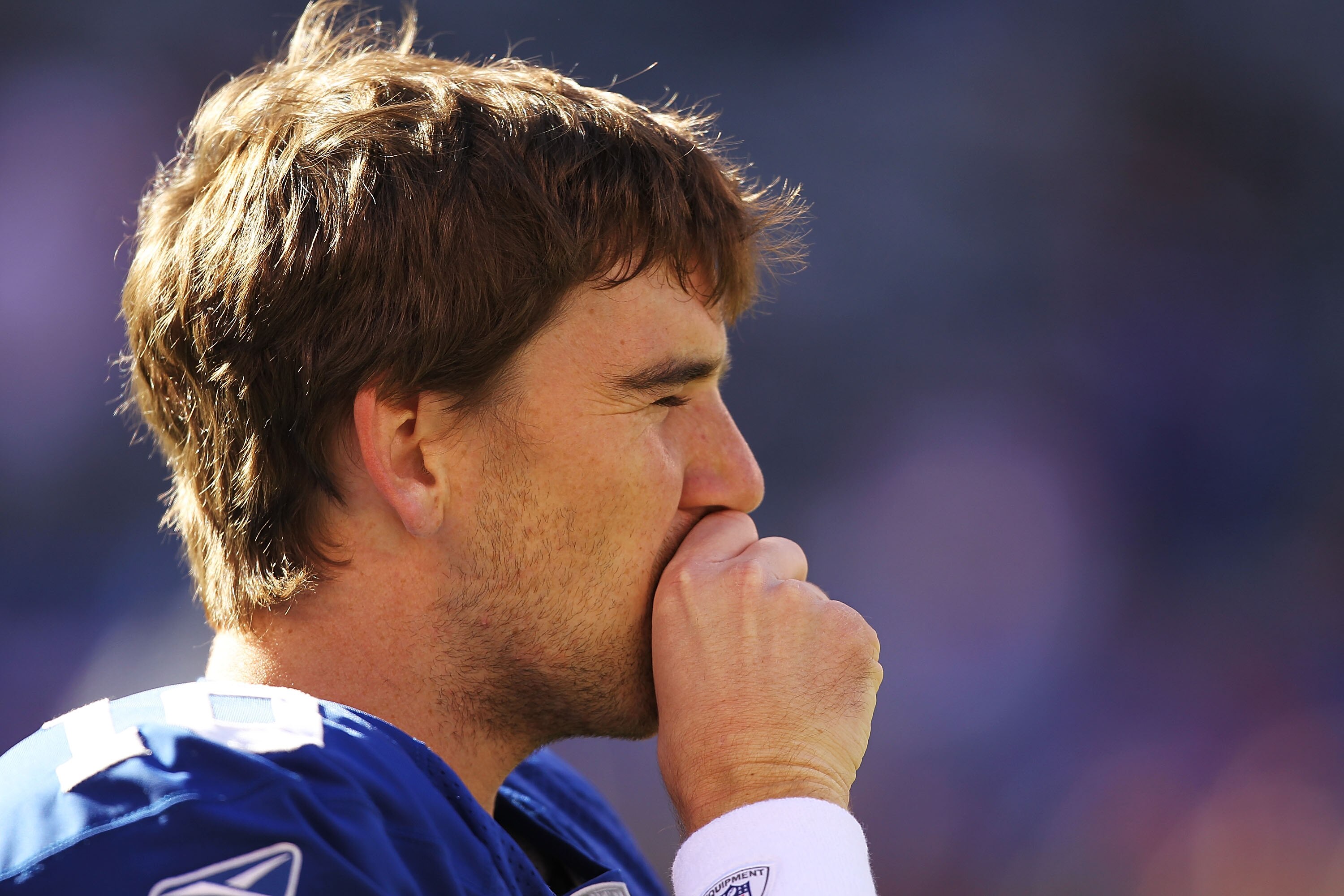 EAST RUTHERFORD, NJ - NOVEMBER 28:  Eli Manning #10 of the New York Giants looks on against the Jacksonville Jaguars during their game on November 28, 2010 at The New Meadowlands Stadium in East Rutherford, New Jersey.  (Photo by Al Bello/Getty Images)