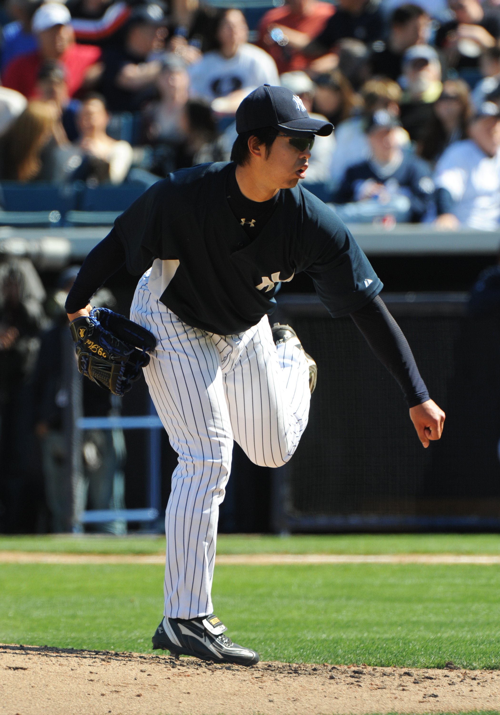 TAMPA, FL - MARCH 5: Pitcher Kei Igawa #17 of the New York Yankees throws in relief against the Tampa Bay Rays March 5, 2010 at the George M. Steinbrenner  Field in Tampa, Florida. (Photo by Al Messerschmidt/Getty Images)