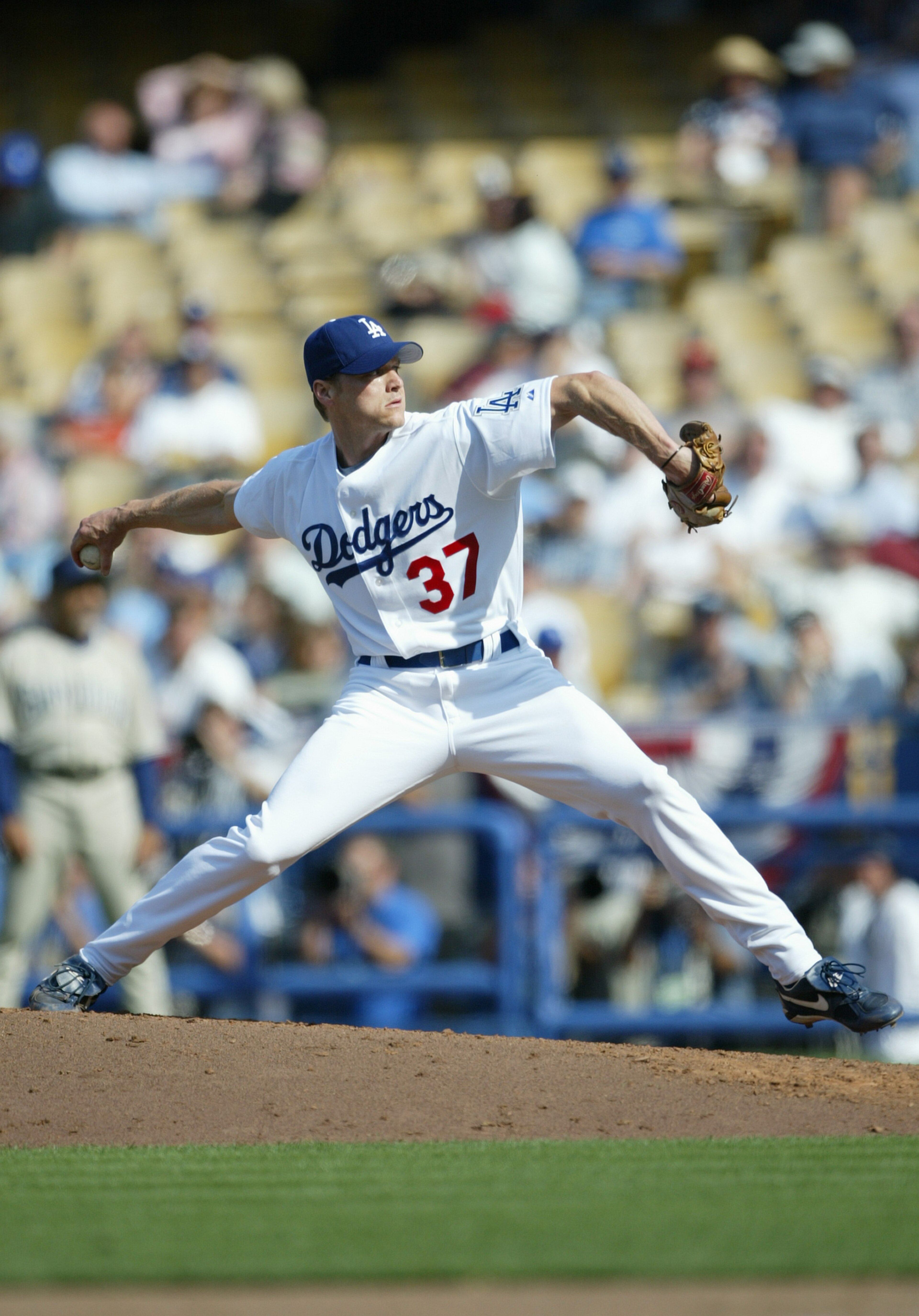 LOS ANGELES - APRIL 5:  Pitcher Darren Dreifort #37 of the Los Angeles Dodgers winds back to pitch during the game against the San Diego Padres on April 5, 2004 at Dodger Stadium in Los Angeles, California. The Padres defeated the Dodgers 8-2 in the seaso