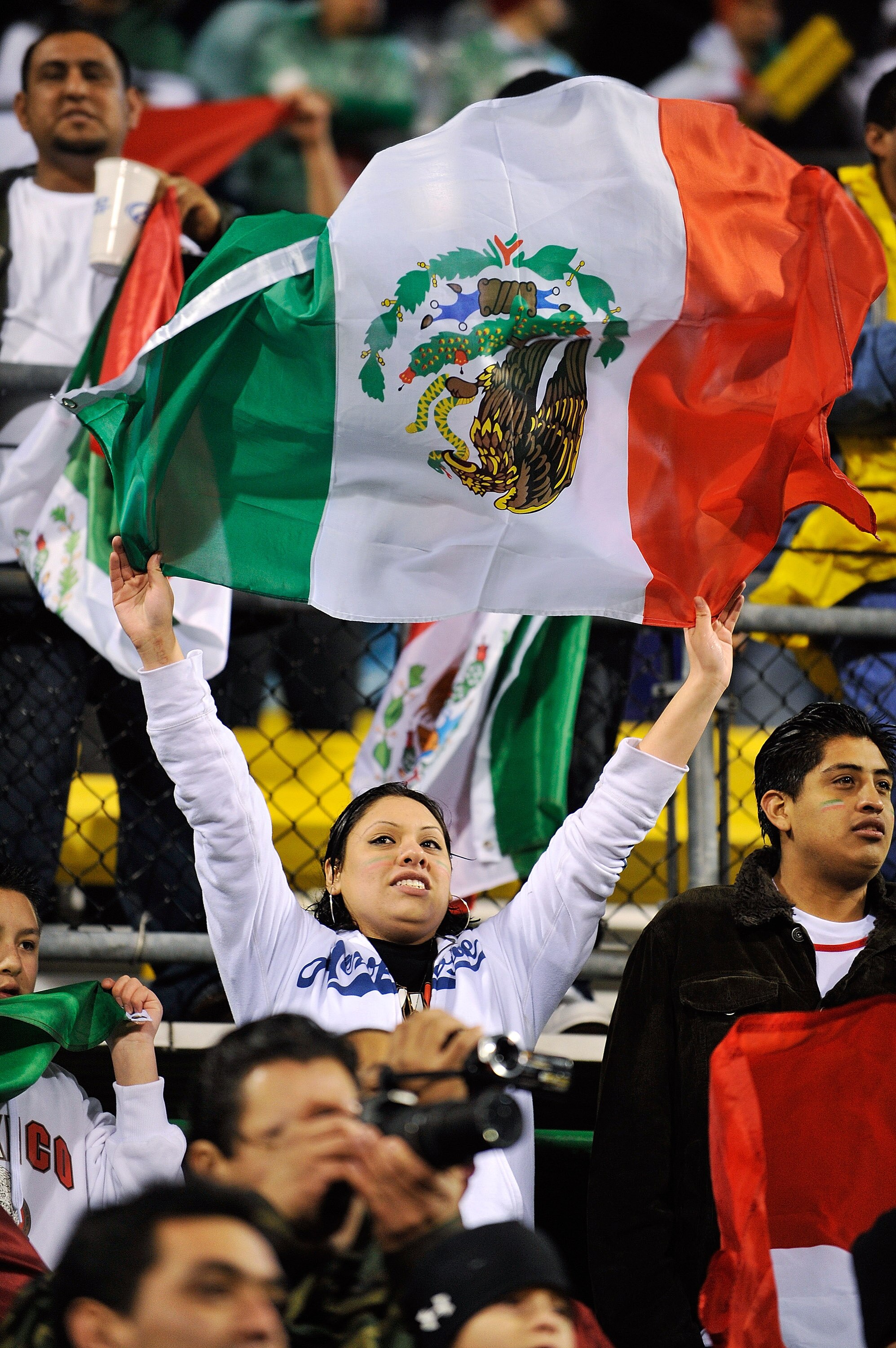 COLUMBUS, OH - FEBRUARY 11: A fan of the Mexican team waves a flag before the start of the game between Mexico and the U.S. Men's National Team for their FIFA World Cup qualifying match on February 11, 2009 at  Columbus Crew Stadium in Columbus, Ohio.  (P