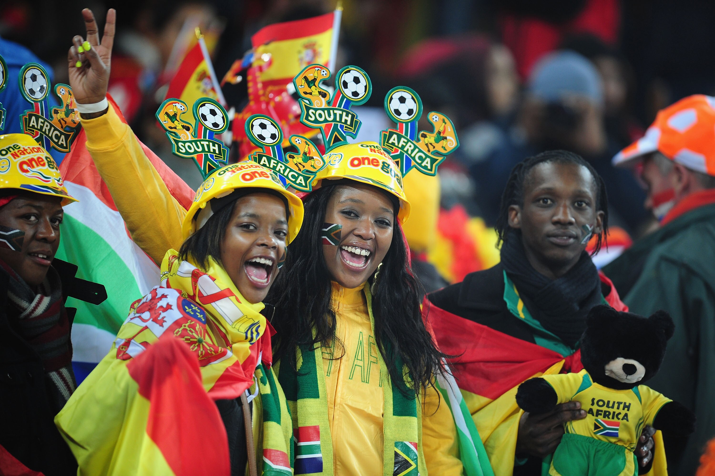 JOHANNESBURG, SOUTH AFRICA - JULY 11: Football fans enjoy the atmosphere prior to the 2010 FIFA World Cup South Africa Final match between Netherlands and Spain at Soccer City Stadium on July 11, 2010 in Johannesburg, South Africa.  (Photo by Clive Mason/