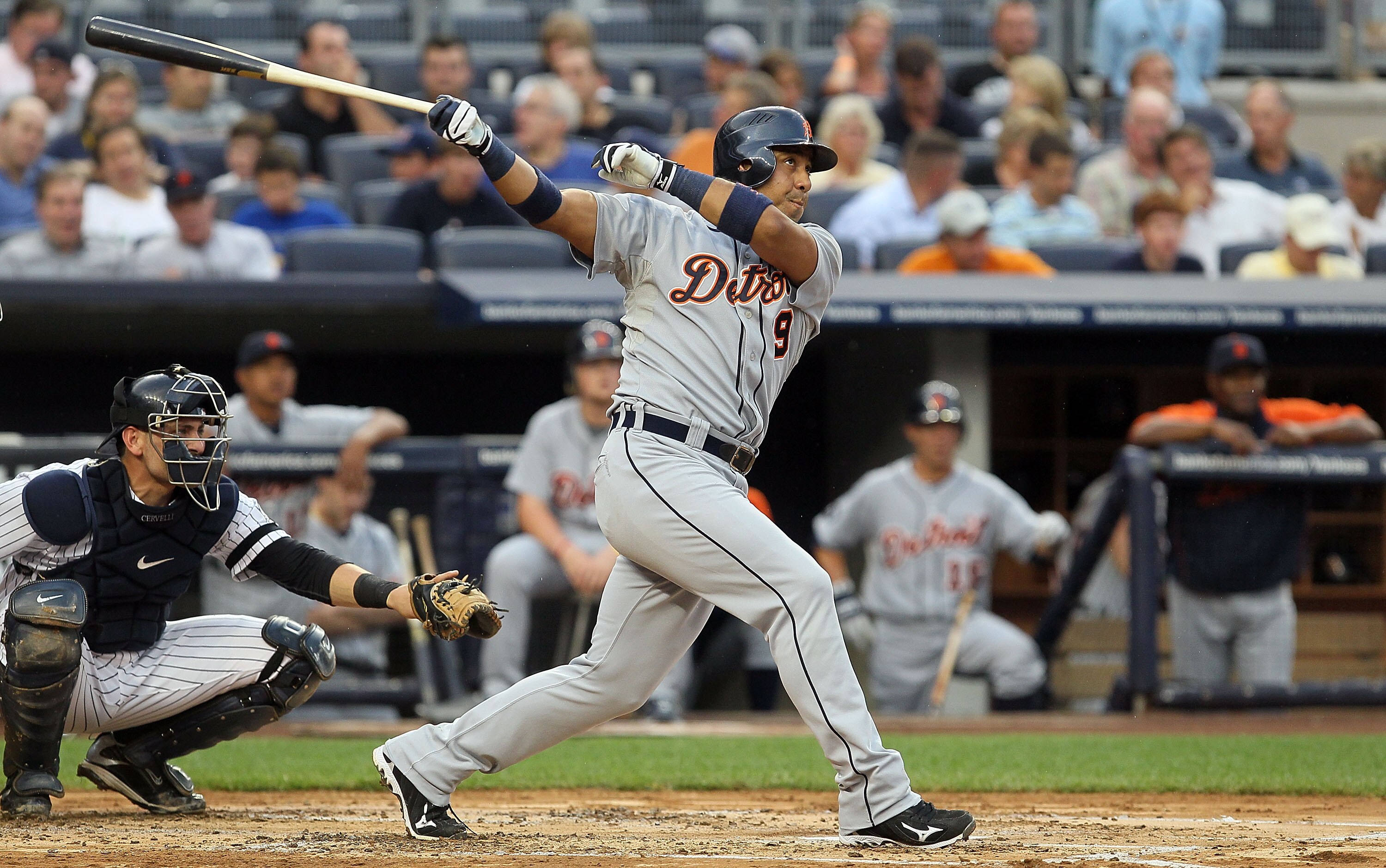 NEW YORK - AUGUST 16:  Carlos Guillen #9 of the Detroit Tigers follows through on a second inning double against the New York Yankees on August 16, 2010 at Yankee Stadium in the Bronx borough of New York City.  (Photo by Jim McIsaac/Getty Images)