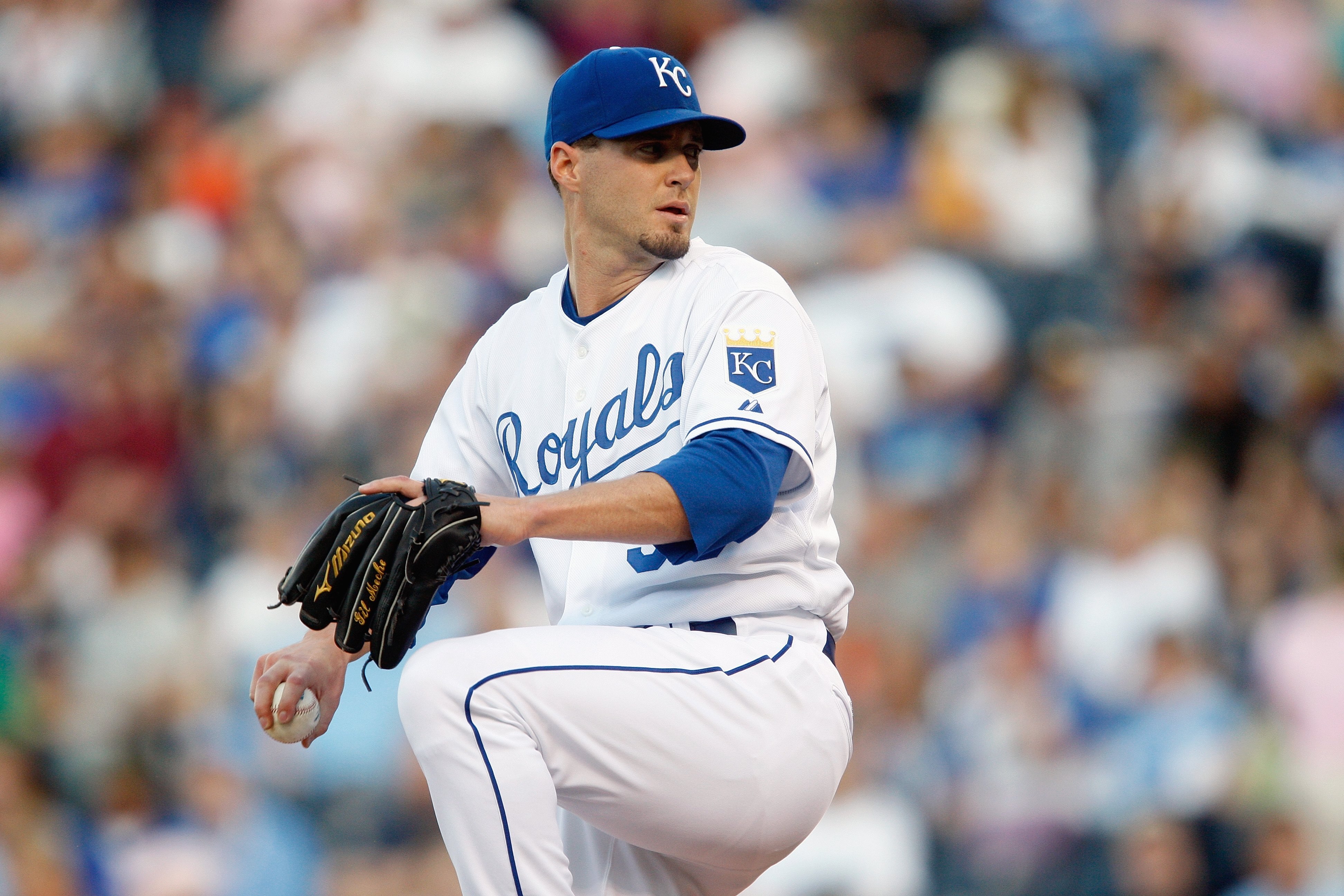 KANSAS CITY - MAY 14: Gil Meche #55 of the Kansas City Royals lines up the pitch during the game between the Baltimore Orioles on May 14, 2009 at Kauffman Stadium in Kansas City, Missouri. (Photo by: Jamie Squire/Getty Images)