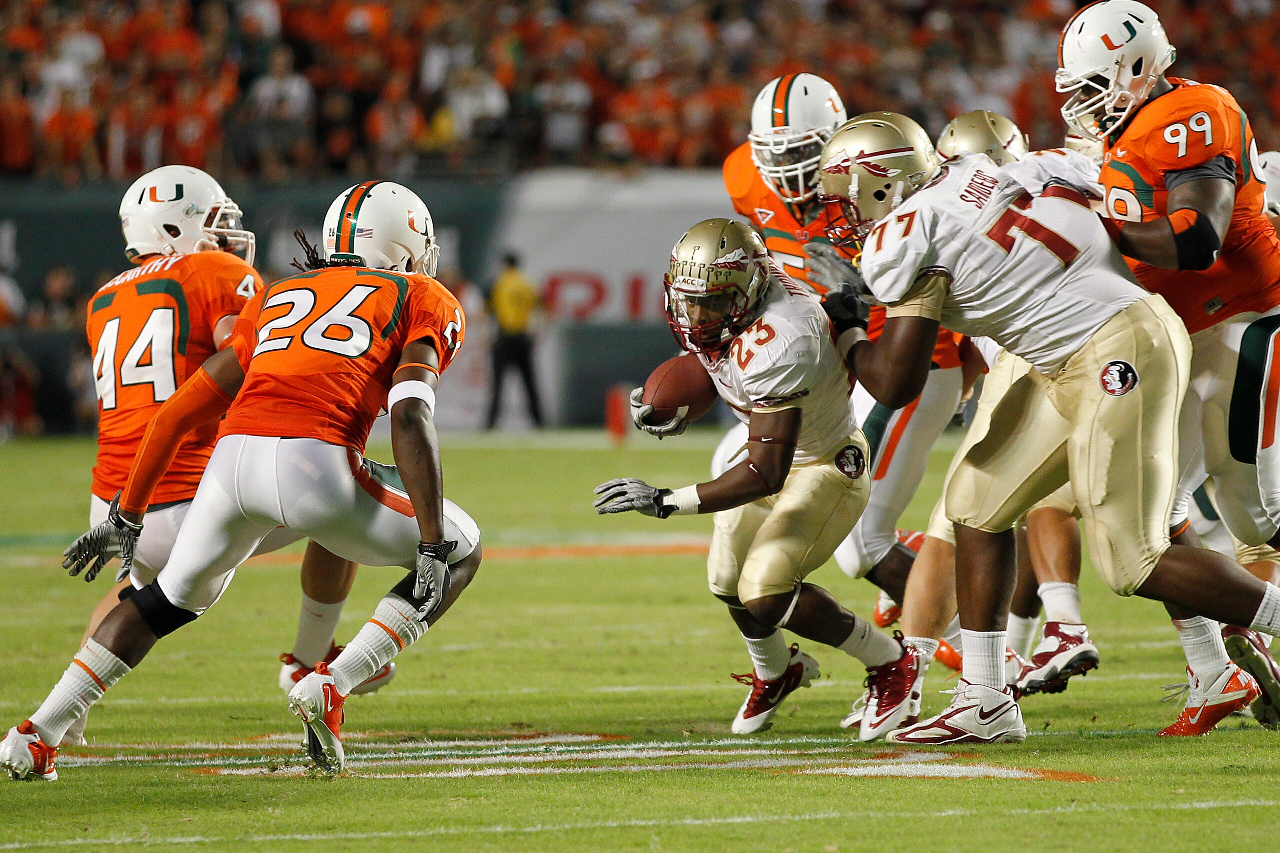MIAMI, FL - OCTOBER 9: Chris Thompson #23 of the Florida State Seminoles runs with the ball against the Miami Hurricanes on October 9, 2010 at Sun Life Stadium in Miami, Florida. (Photo by Joel Auerbach/Getty Images)