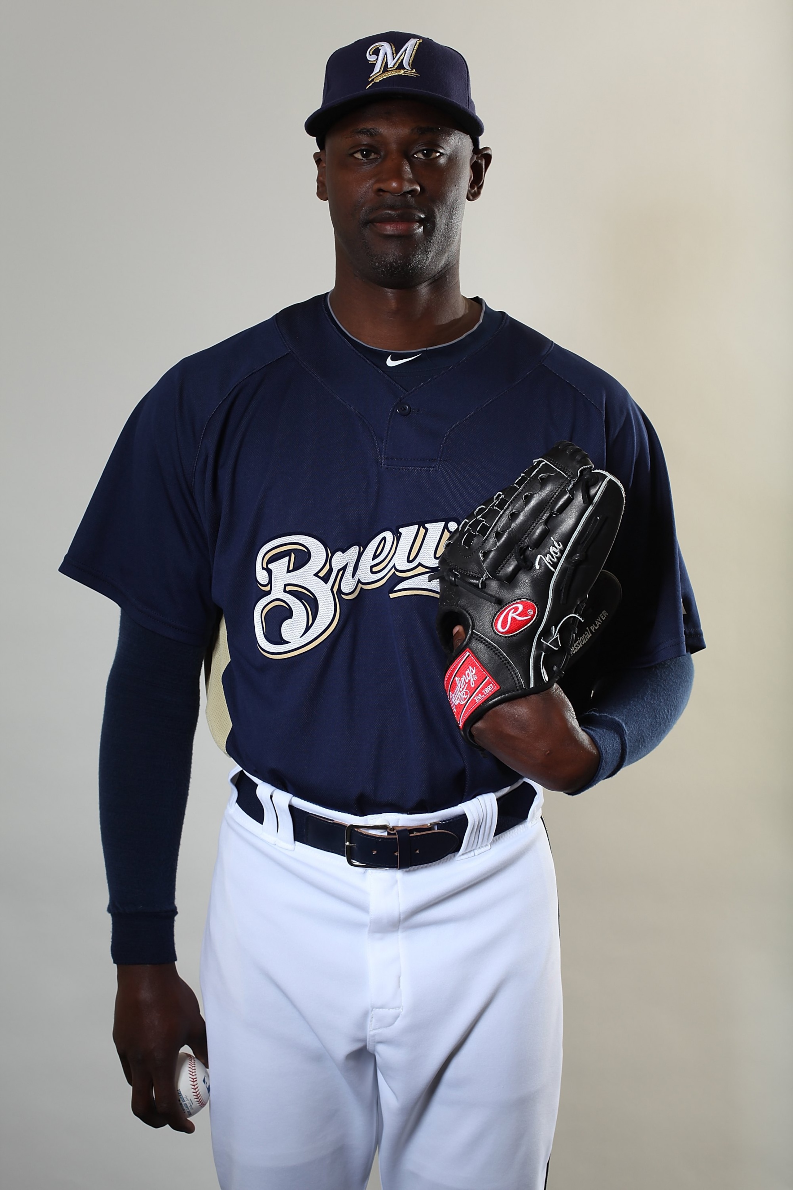 MARYVALE, AZ - MARCH 01:  LaTroy Hawkins #32 poses for a portrait during the Milwaukee Brewers Photo Day at the Maryvale  Baseball Park on March 1, 2010 in Maryvale, Arizona.  (Photo by Jonathan Ferrey/Getty Images)