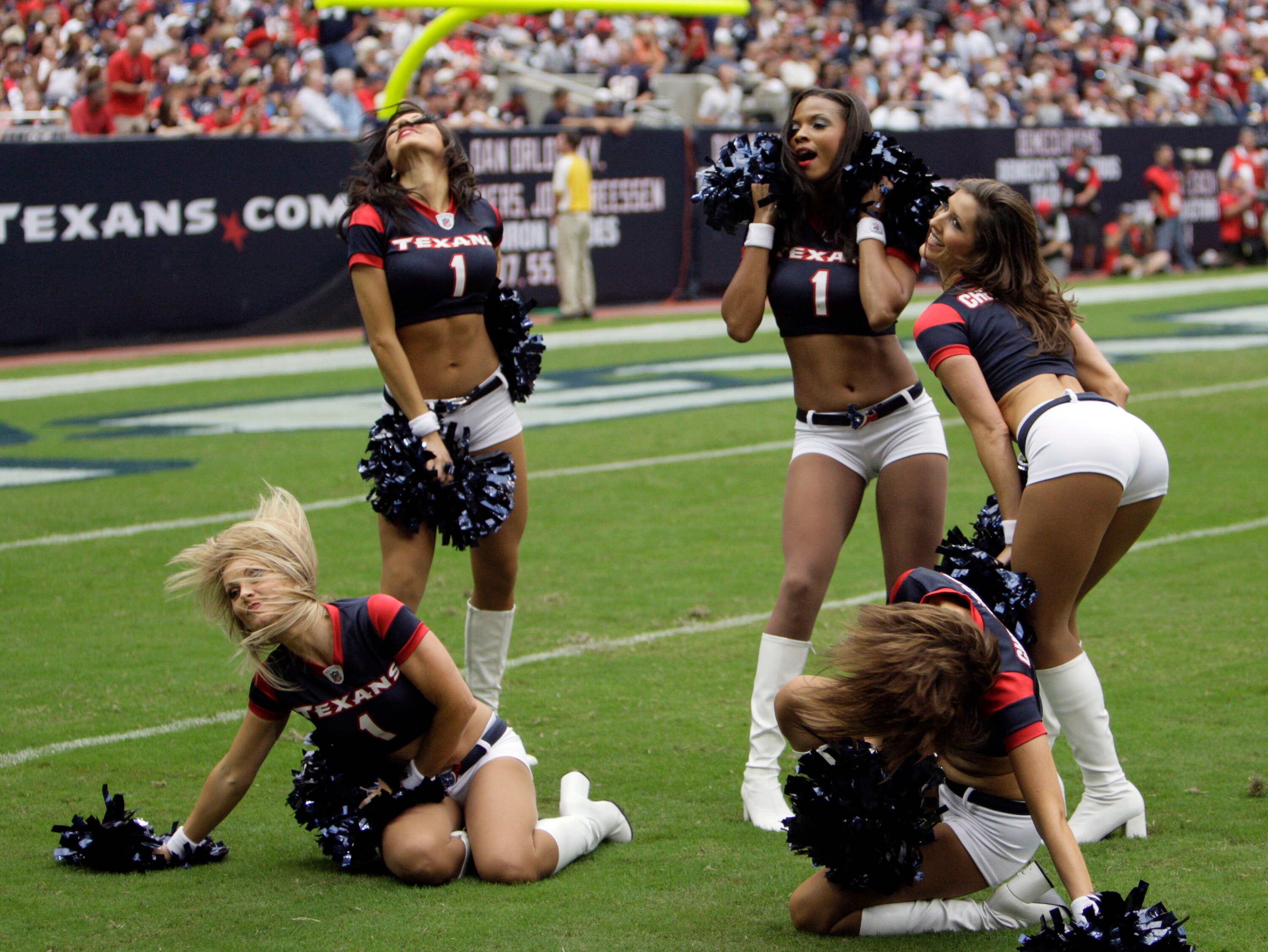HOUSTON - SEPTEMBER 26:  The Houston Texans cheerleaders perform in the second half during a football game between the Dallas Cowboys and Houston Texans at Reliant Stadium on September 26, 2010 in Houston, Texas.  (Photo by Bob Levey/Getty Images)