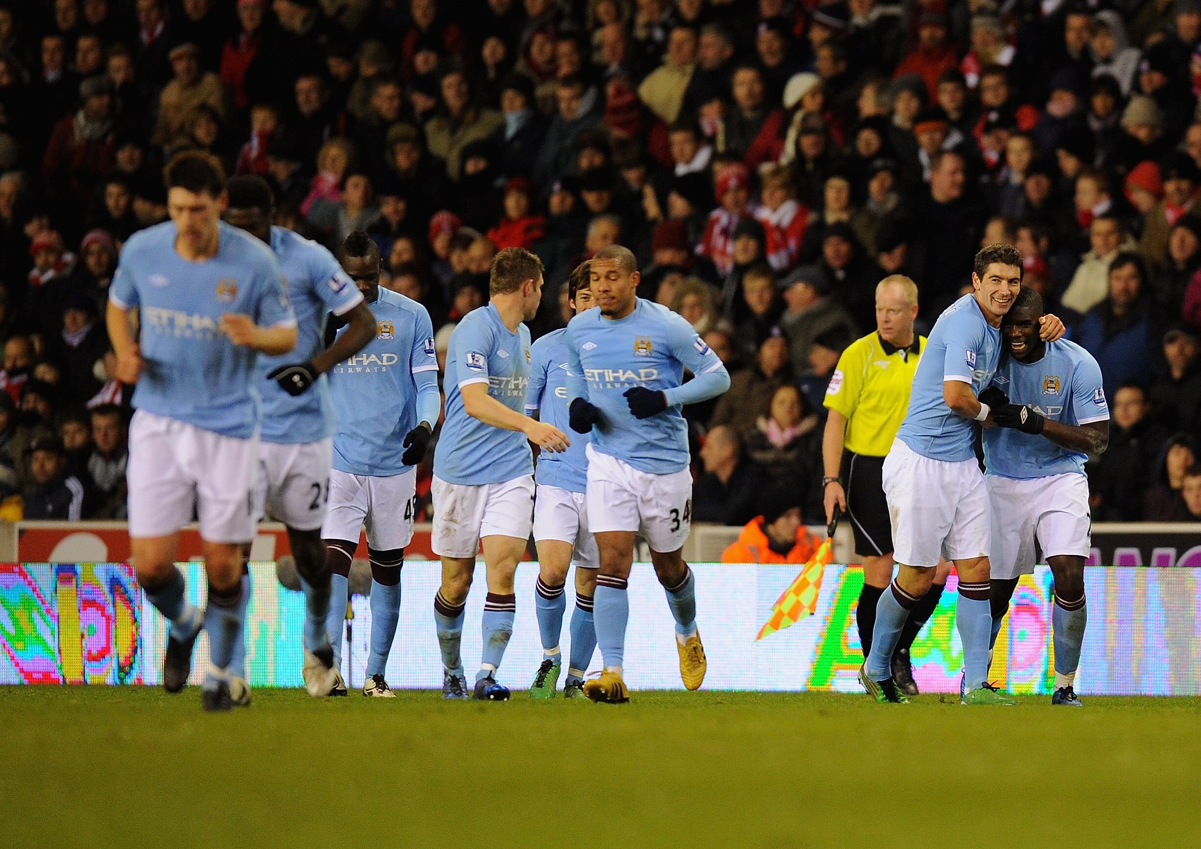 STOKE ON TRENT, ENGLAND - NOVEMBER 27:  Micah Richards of Manchester City is congratulated on his goal during the Barclays Premier League match between Stoke City and Manchester City at Britannia Stadium on November 27, 2010 in Stoke on Trent, England.  (