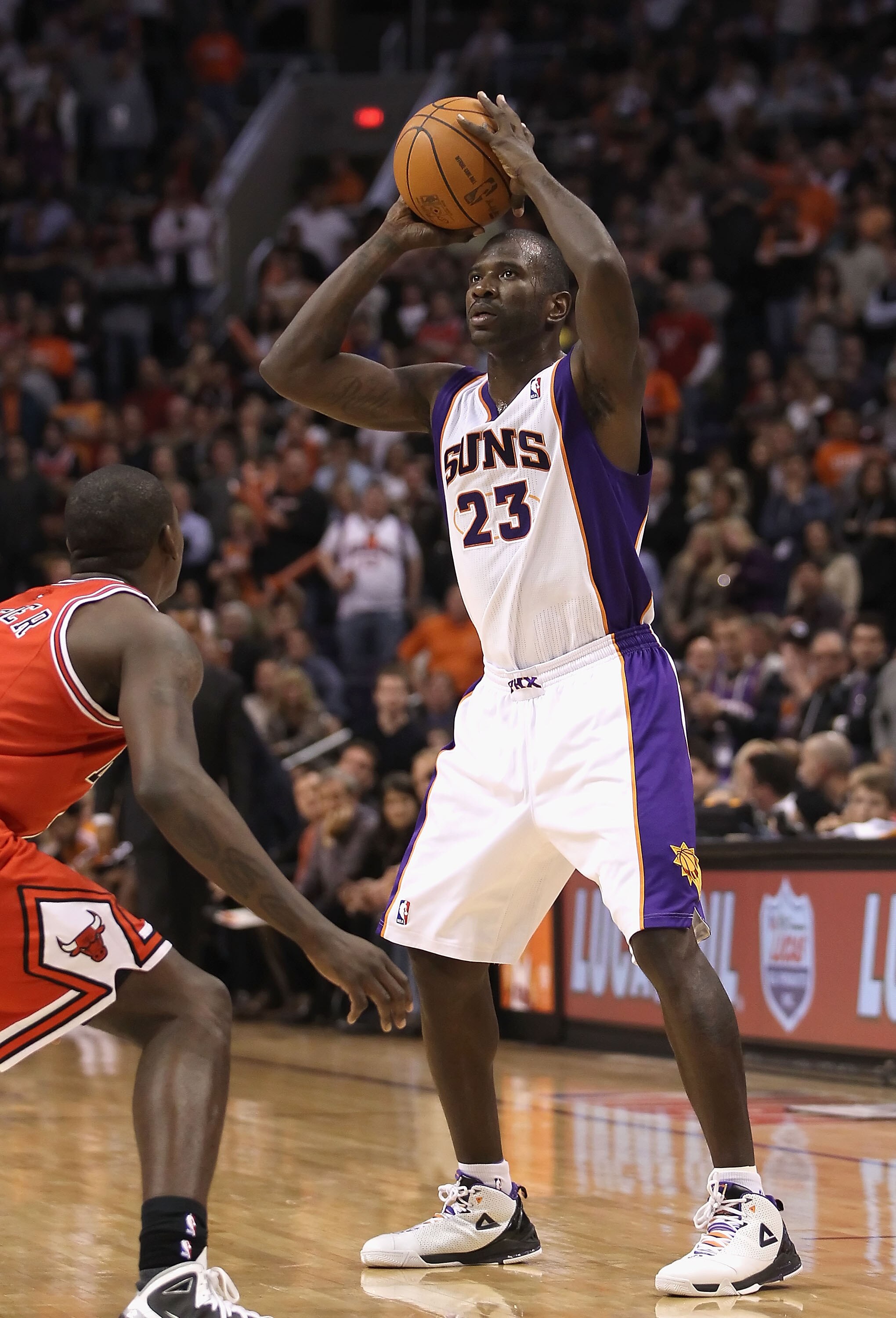 PHOENIX - NOVEMBER 24:  Jason Richardson #23 of the Phoenix Suns looks to pass the ball during the NBA game against the Chicago Bulls at US Airways Center on November 24, 2010 in Phoenix, Arizona. NOTE TO USER: User expressly acknowledges and agrees that,