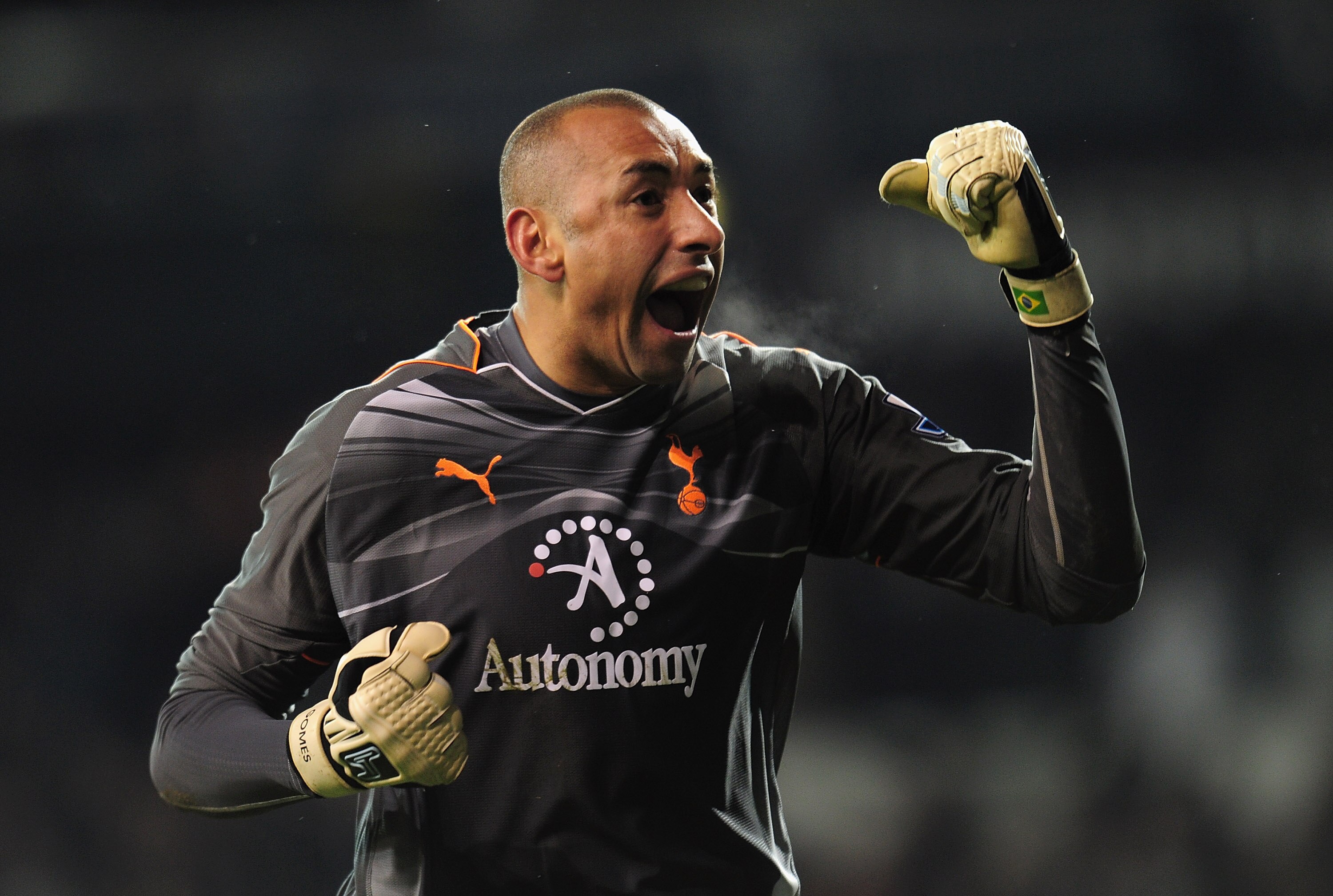 LONDON, ENGLAND - NOVEMBER 28:  Heurelho Gomes of Tottenham Hotspur celebrates victory in the Barclays Premier League match between Tottenham Hotspur and Liverpool at White Hart Lane on November 28, 2010 in London, England.  (Photo by Shaun Botterill/Gett