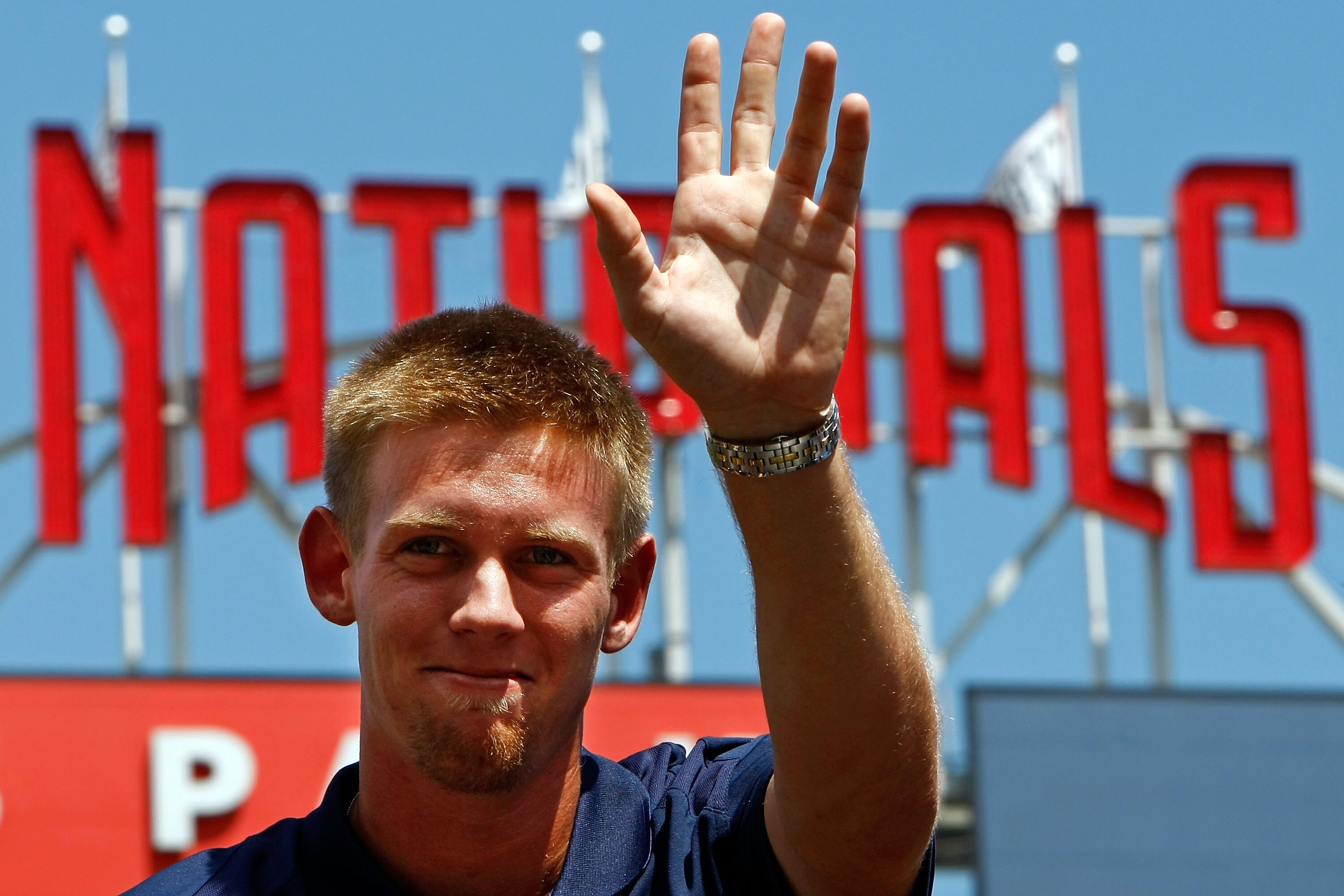 WASHINGTON - AUGUST 21:  Stephen Strasburg, the overall first pick in the 2009 Major League Baseball draft, waves to fans as he takes part in a press conference where he was introduced at Nationals Park August 21, 2009 in Washington, DC. Strasburg, a righ